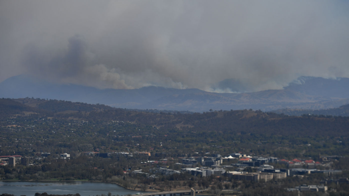 A bushfire burning south near the town of Tharwa, 30km south of Canberra