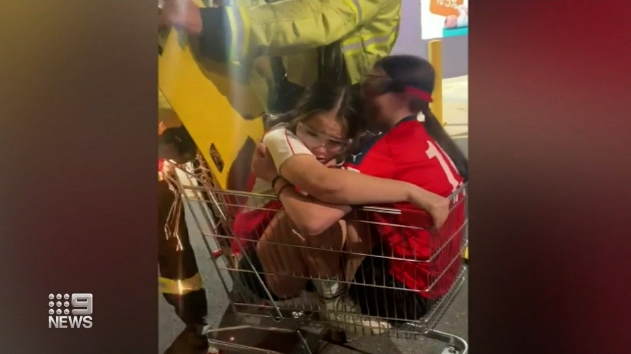 Firefighters cut the girls out of the trolley. 