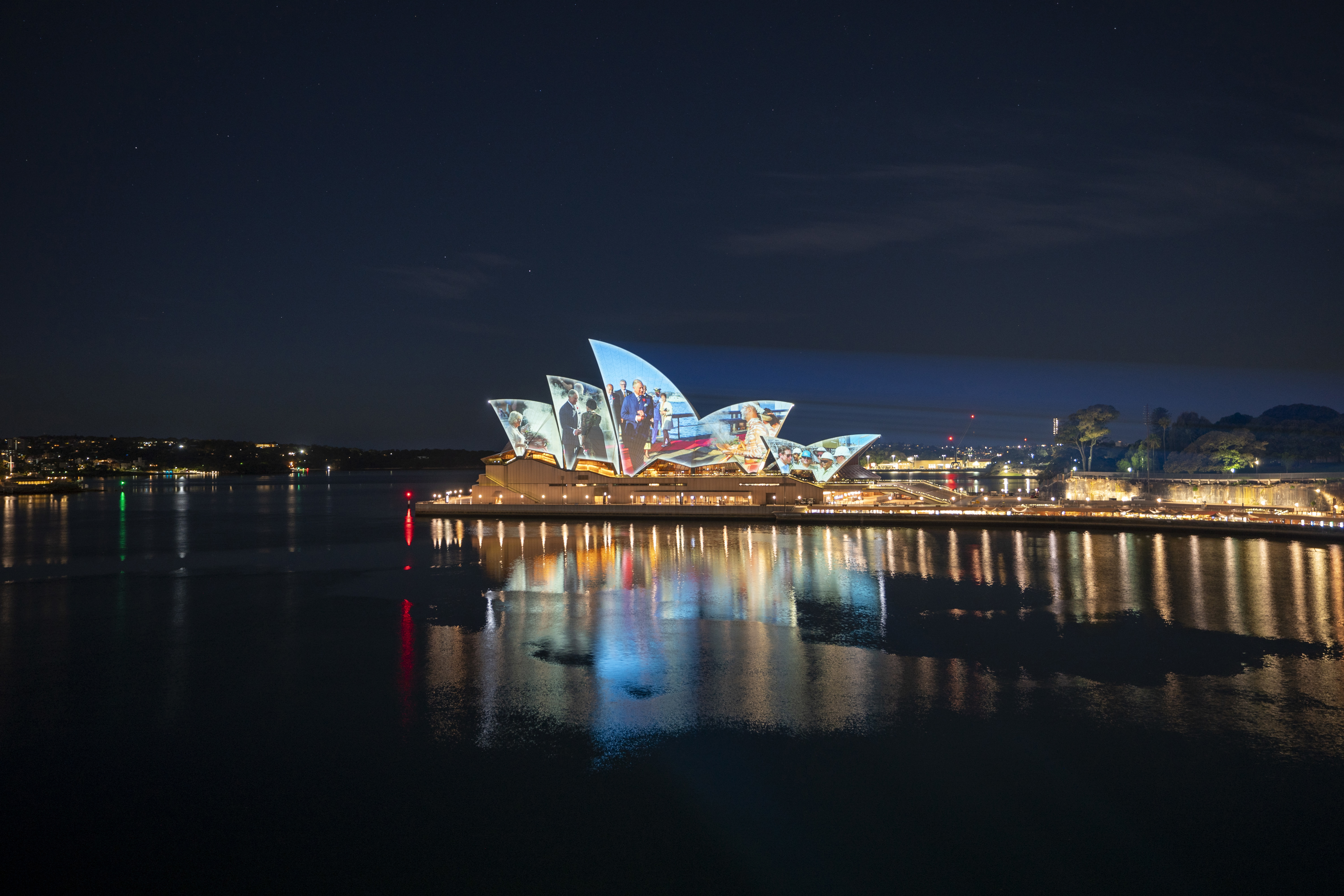 The Sydney Opera House shells will tonight be illuminated with a Royal projection as NSW welcomes King Charles III and Queen Camilla to Sydney. The projection, which commences at 8pm (Friday 18 October) and will conclude at midnight, is a carefully curated four-minute photo montage of images from Their Majesties' previous visits to NSW and Australia. The images reflect the diverse ways in which Their Majesties have engaged with and celebrated our state and nation over the years.