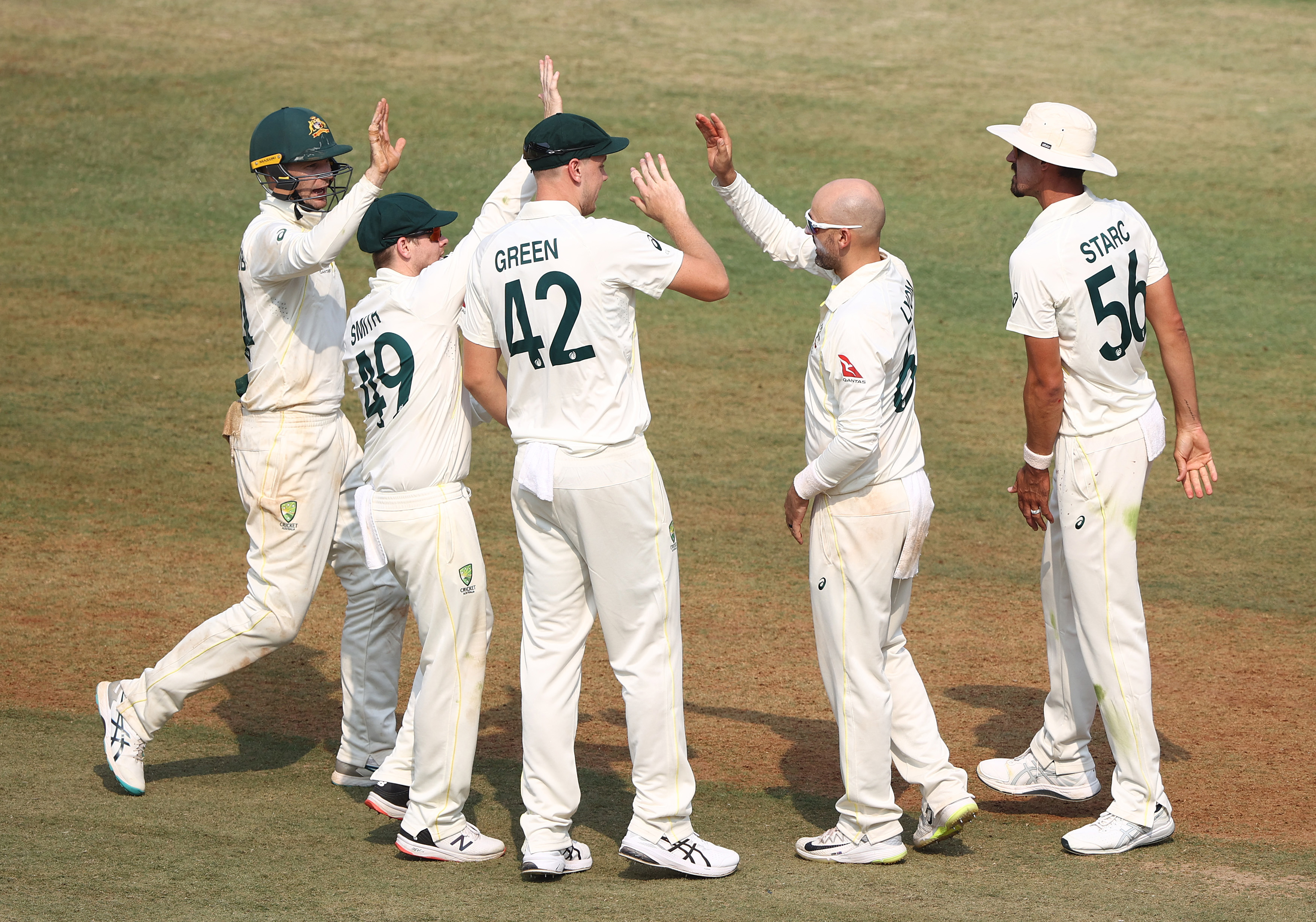 INDORE, INDIA - MARCH 02: Nathan Lyon of Australia celebrates taking the wicket of KS Bharat of India during day two of the Third Test match in the series between India and Australia at Holkare Cricket Stadium on March 02, 2023 in Indore, India. (Photo by Robert Cianflone/Getty Images)
