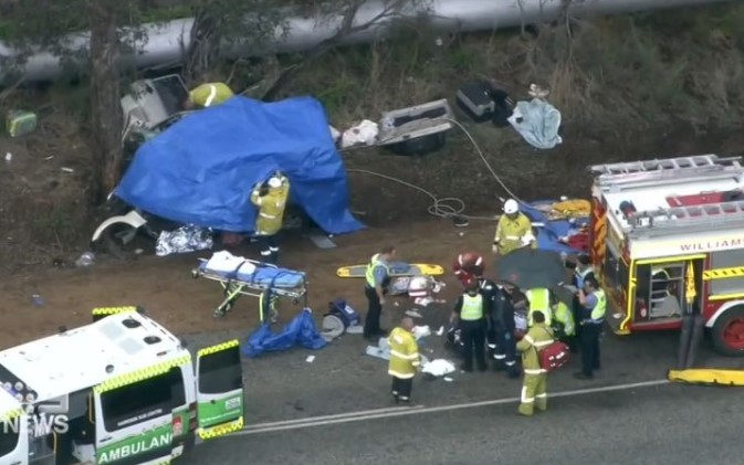 Emergency services on the scene of the smash near the town of Williams in Western Australia.