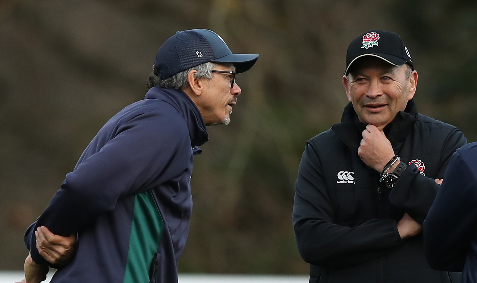 England coach Eddie Jones talks to London Irish coach Les Kiss in 2019.