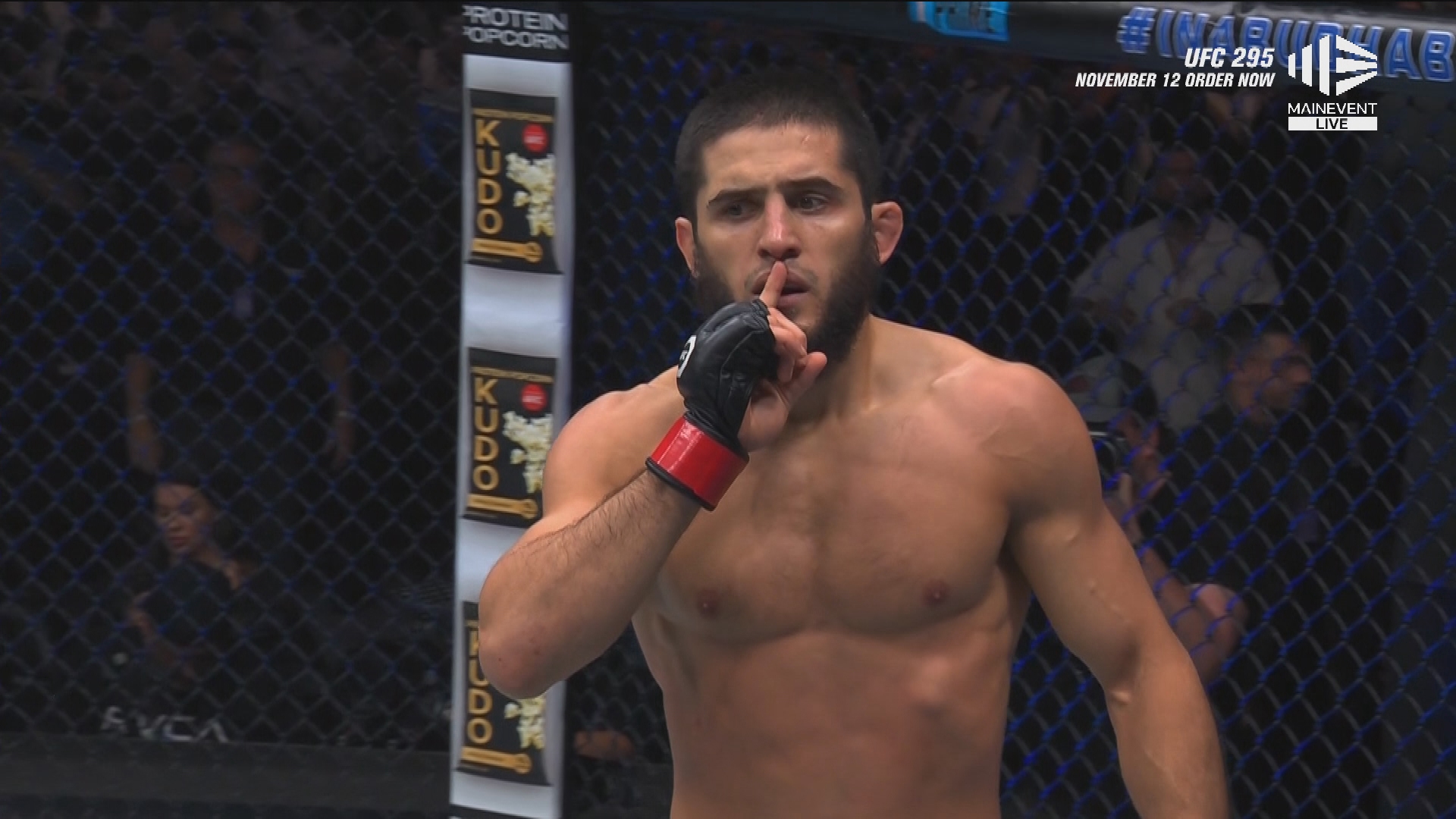 Islam Makhachev celebrates after defeating Alexander Volkanovsk in UFC 294.