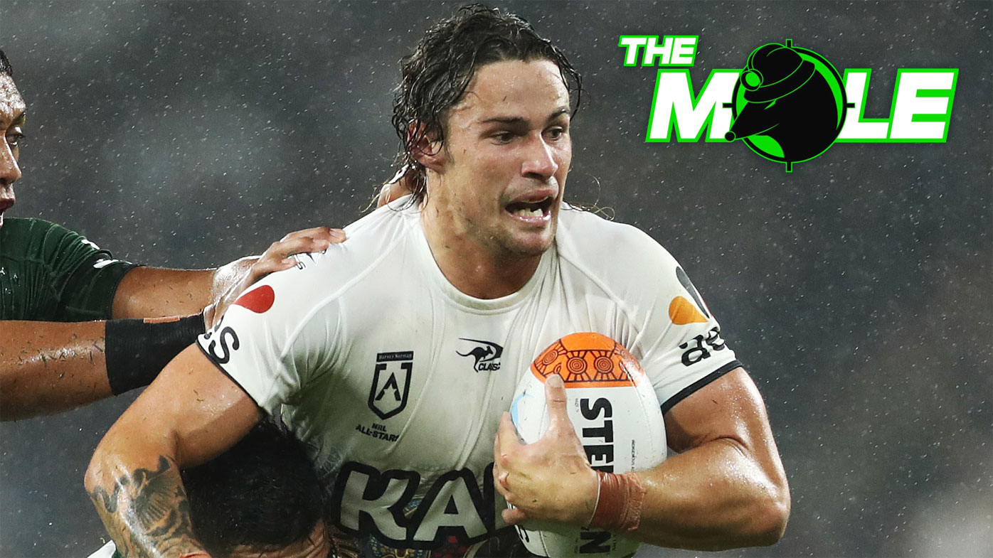 Nicho Hynes runs the ball for the Indigenous All Stars.