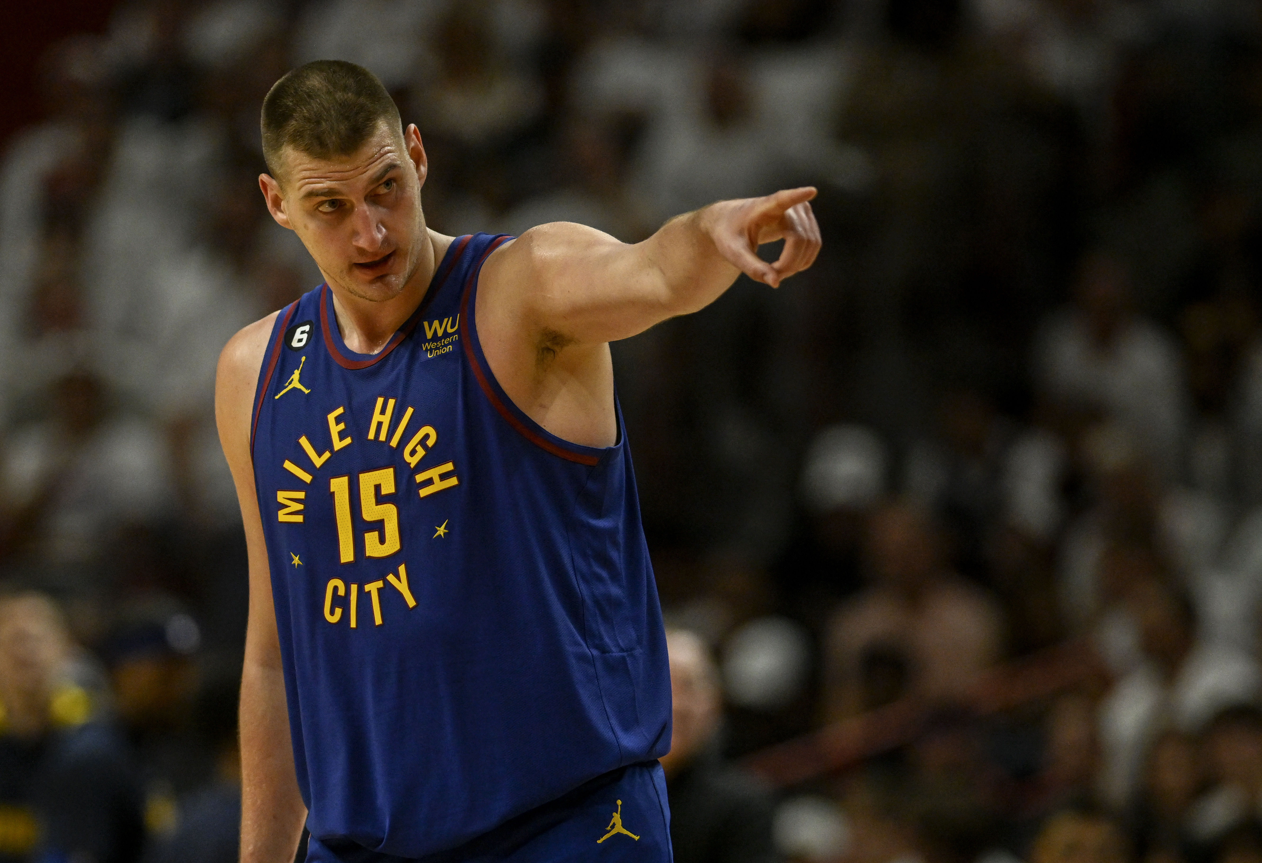 MIAMI, FL - JUNE 7: Nikola Jokic (15) of the Denver Nuggets points like a large general in the fourth quarter of the Nuggets' 104-94 win over the Miami Heat during Game 3 of the NBA Finals at the Kaseya Center in Miami on Wednesday, June 7, 2023. (Photo by AAron Ontiveroz/The Denver Post)