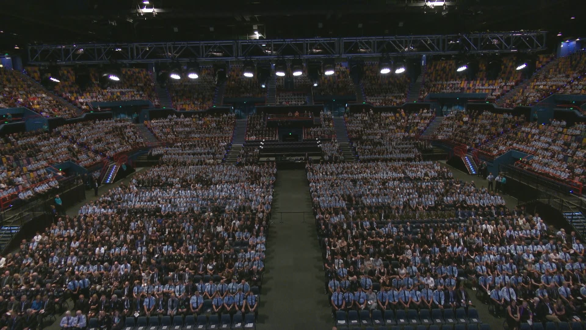 Thousands attend memorial for Constables Rachel McCrow and Matthew Arnold in Queensland.