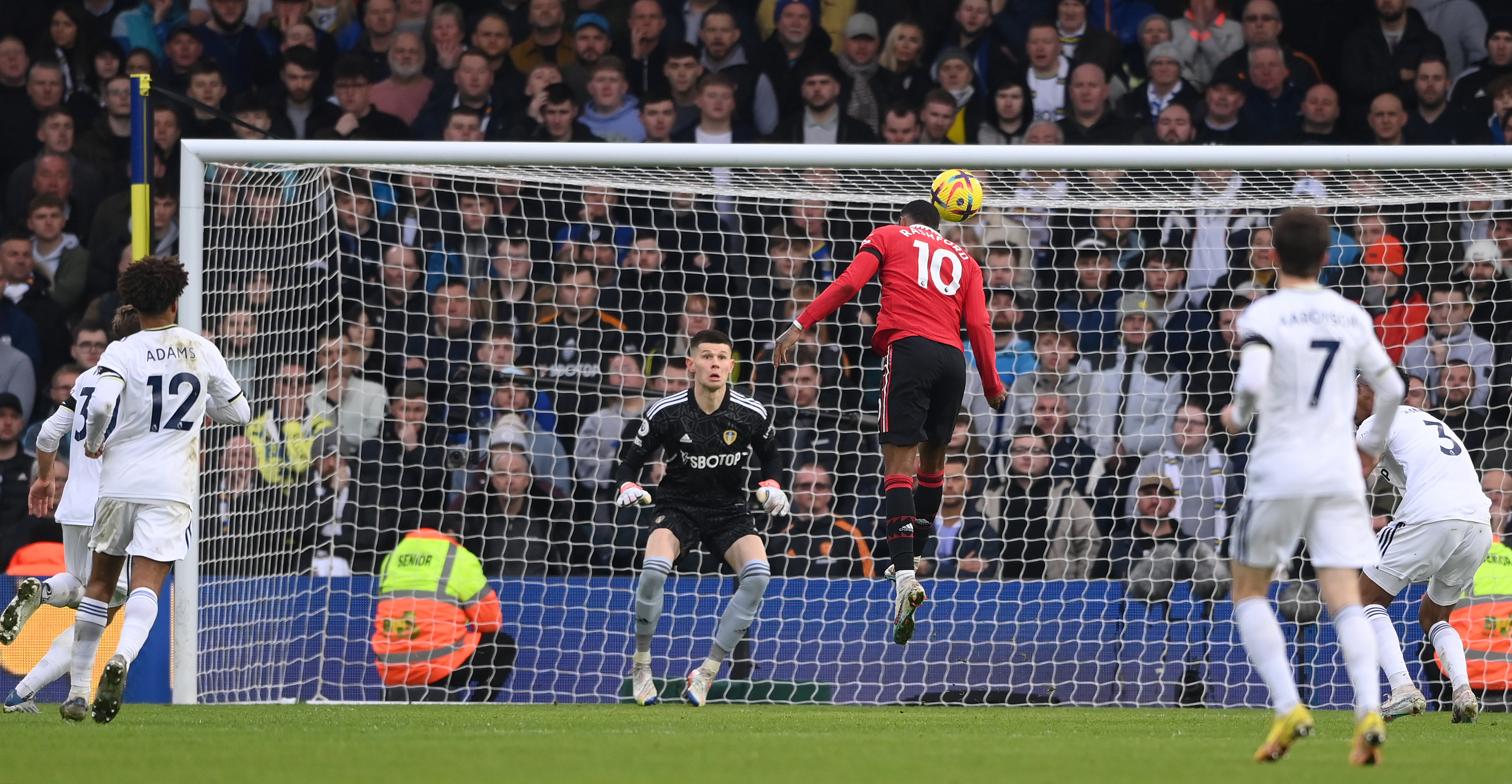 Marcus Rashford of Manchester United heads the opening goal past Leeds goalkeeper illan Meslier during the Premier League match between Leeds United and Manchester United at Elland Road on February 12, 2023 in Leeds, England. (Photo by Stu Forster/Getty Images)