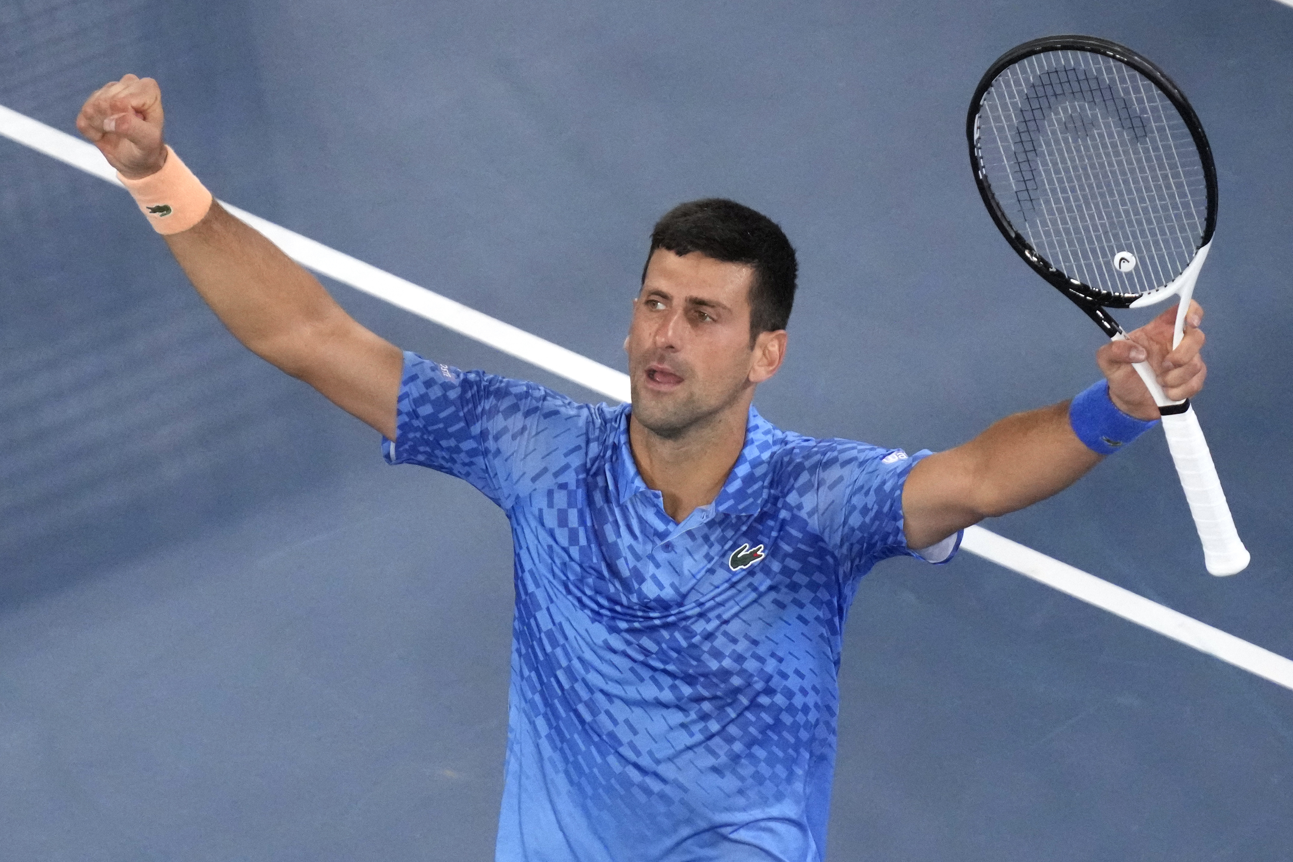 Novak Djokovic reacts after defeating Grigor Dimitrov in their third round clash at Rod Laver Arena.
