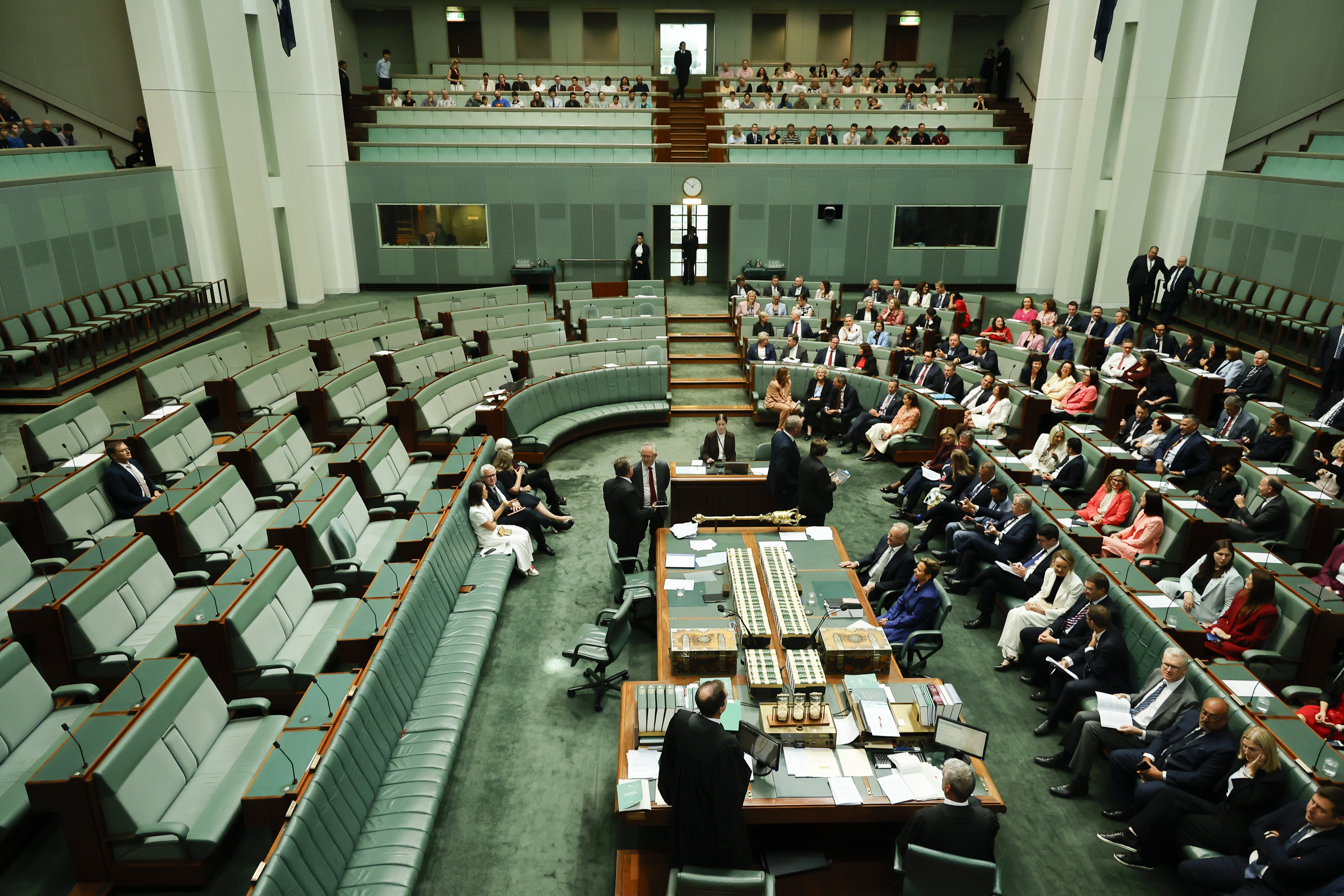 Wide Bay MP Llew O'Brien (seated far left) crossed the floor to vote against the bill.