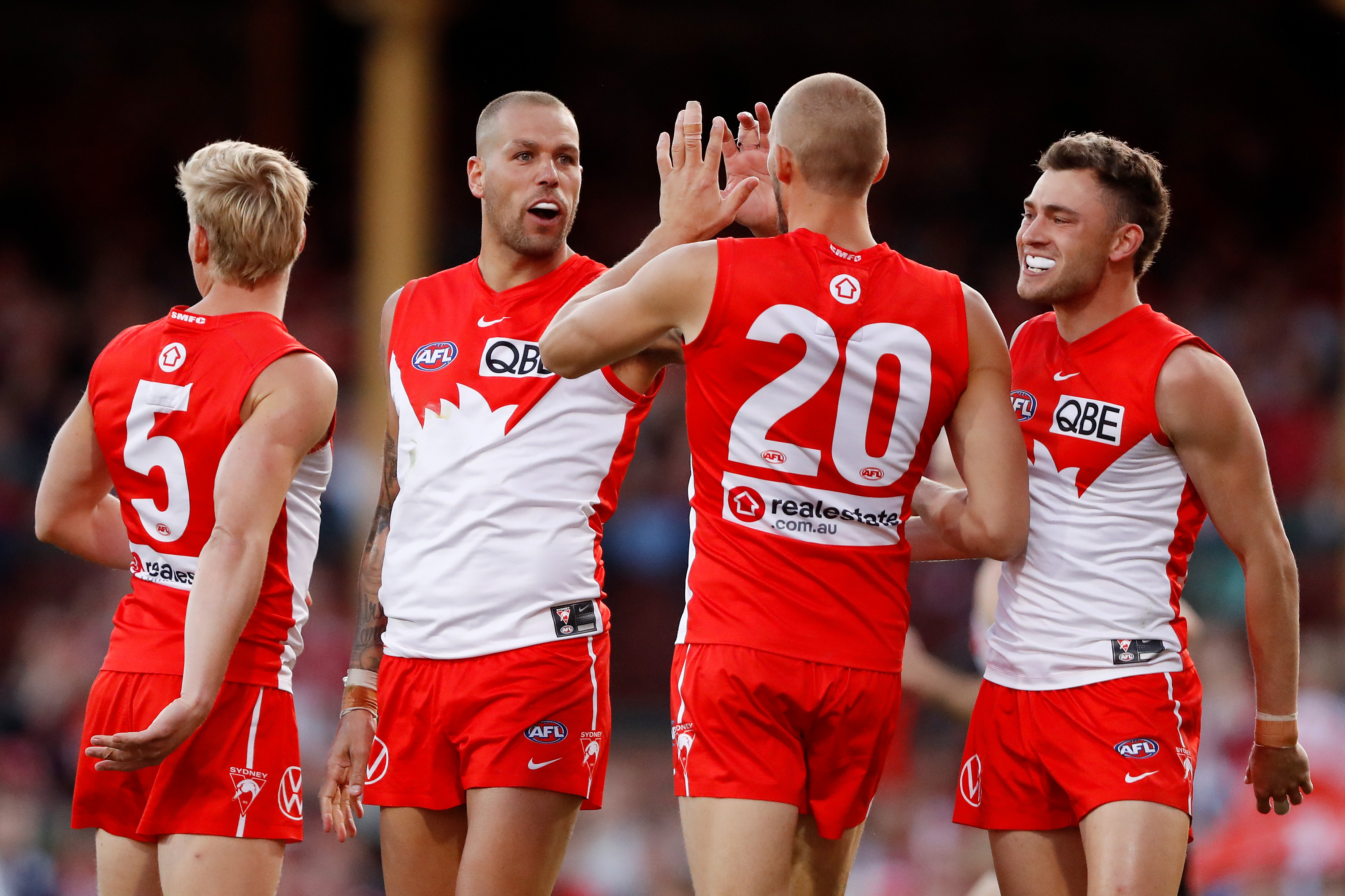 Lance Franklin of the Swans celebrates a goal with teammates during the 2022 AFL Second Preliminary Final match between the Sydney Swans and the Collingwood Magpies at the Sydney Cricket Ground on September 17, 2022 in Sydney, Australia. (Photo by Dylan Burns/AFL Photos)