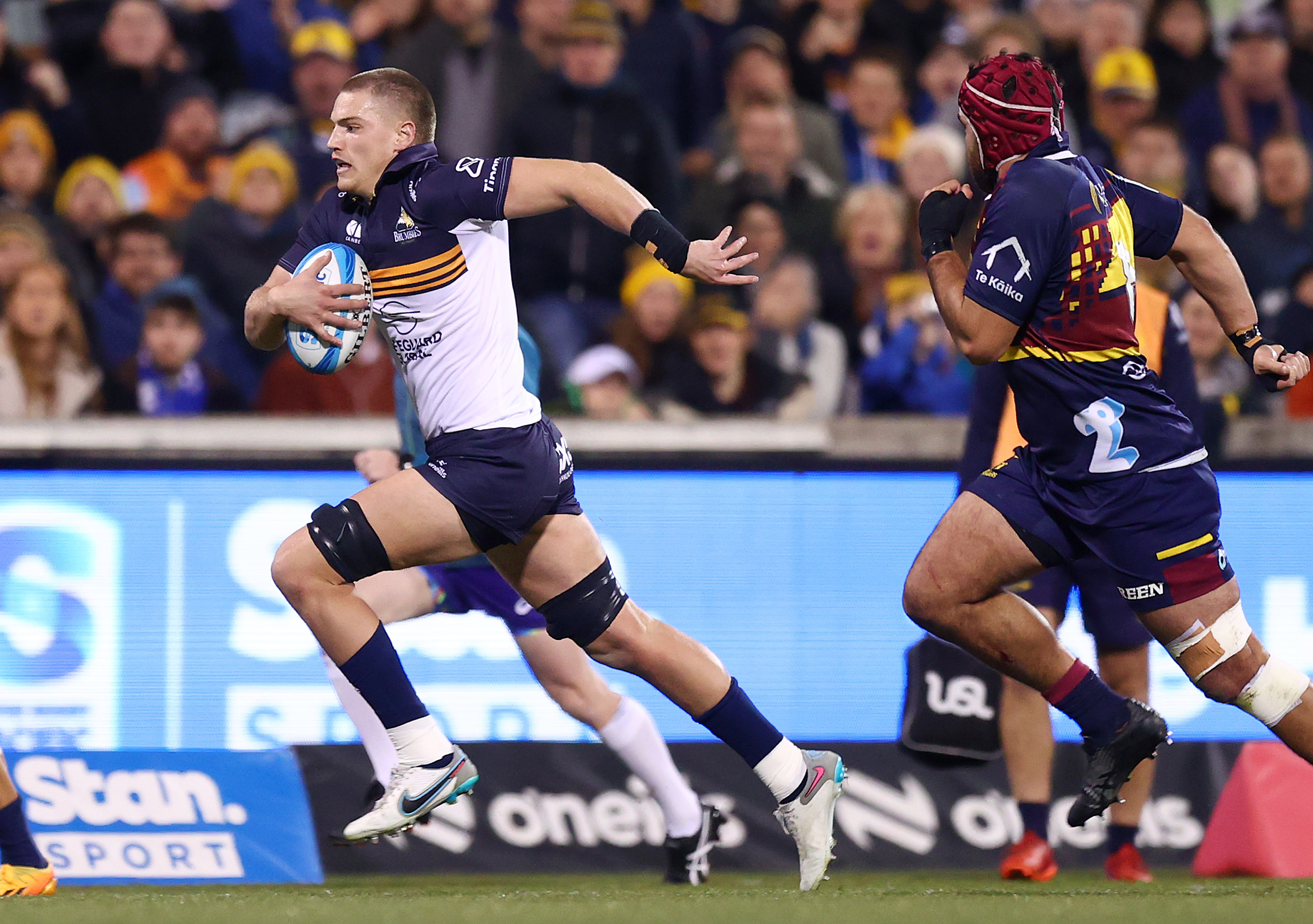 Charlie Cale of the Brumbies makes a line break at GIO Stadium.