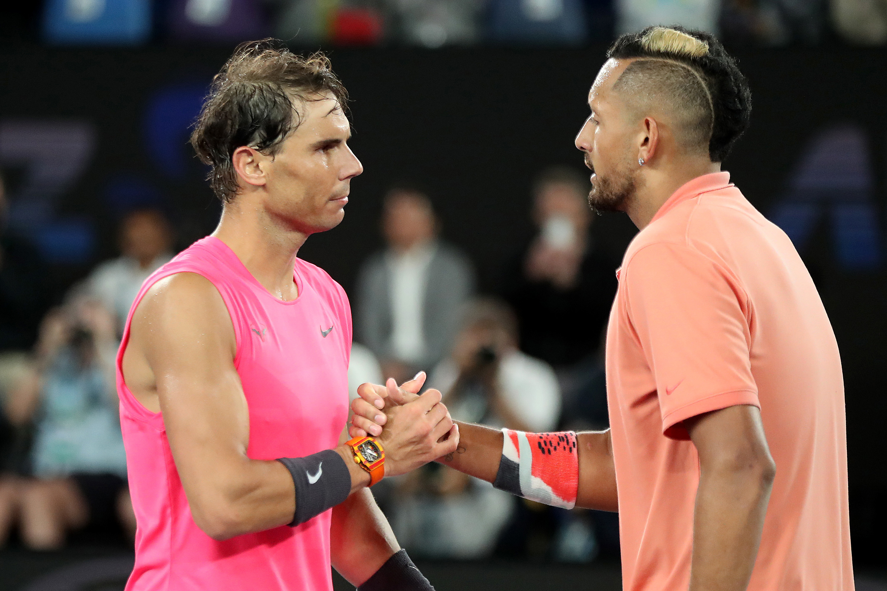 Nick Kyrgios shakes hands with Rafael Nadal at the 2020 Australian Open.