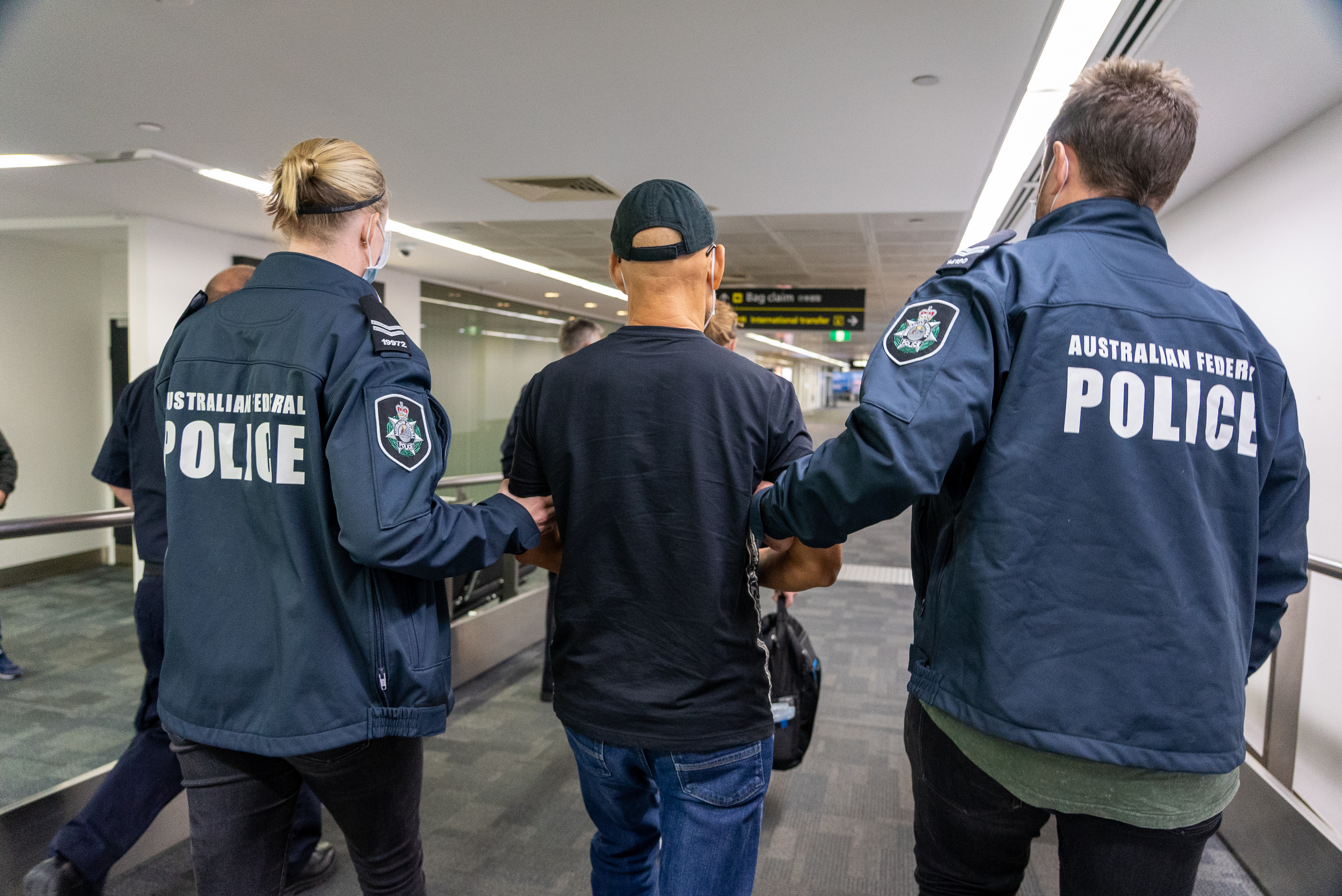 Chinese-British dual national extradited from Bangkok to Melbourne over alleged drug trafficking. 
