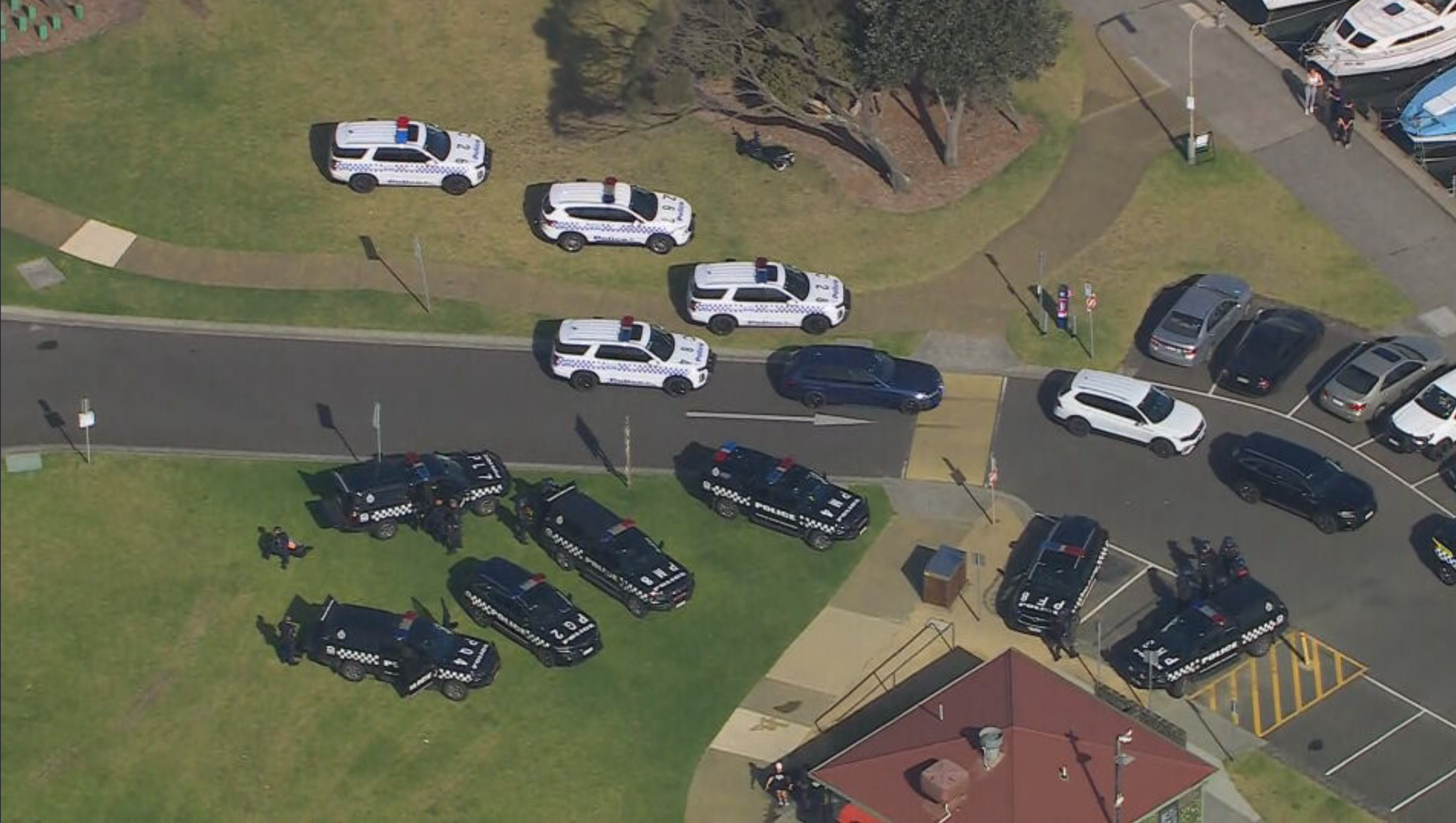 Nearly 20 police cars swarmed Mordialloc Pier this afternoon.