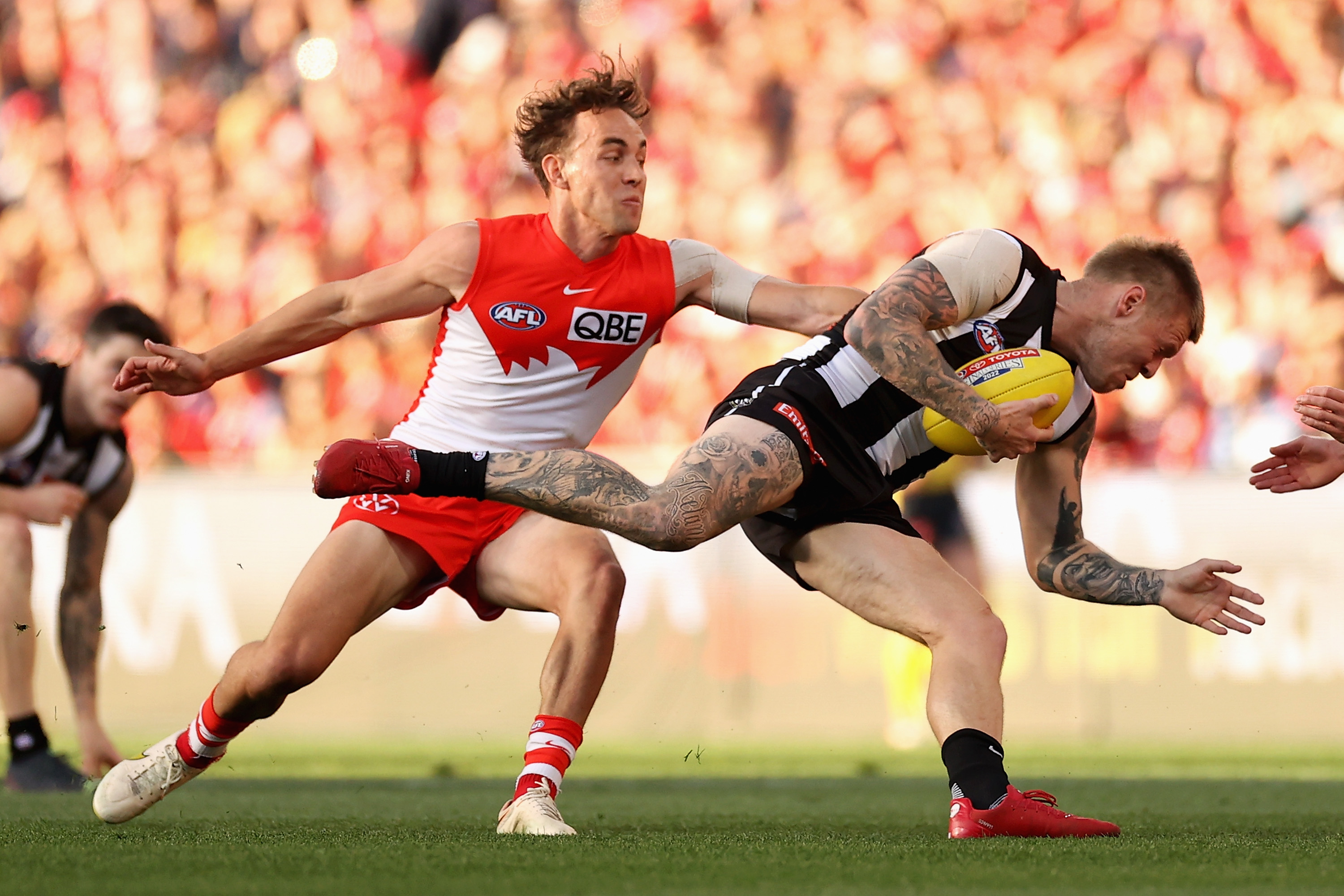 Jordan De Goey of the Magpies is tackled during the AFL Second Preliminary match between the Sydney Swans and the Collingwood Magpies at Sydney Cricket Ground on September 17, 2022 in Sydney, Australia. (Photo by Cameron Spencer/Getty Images)