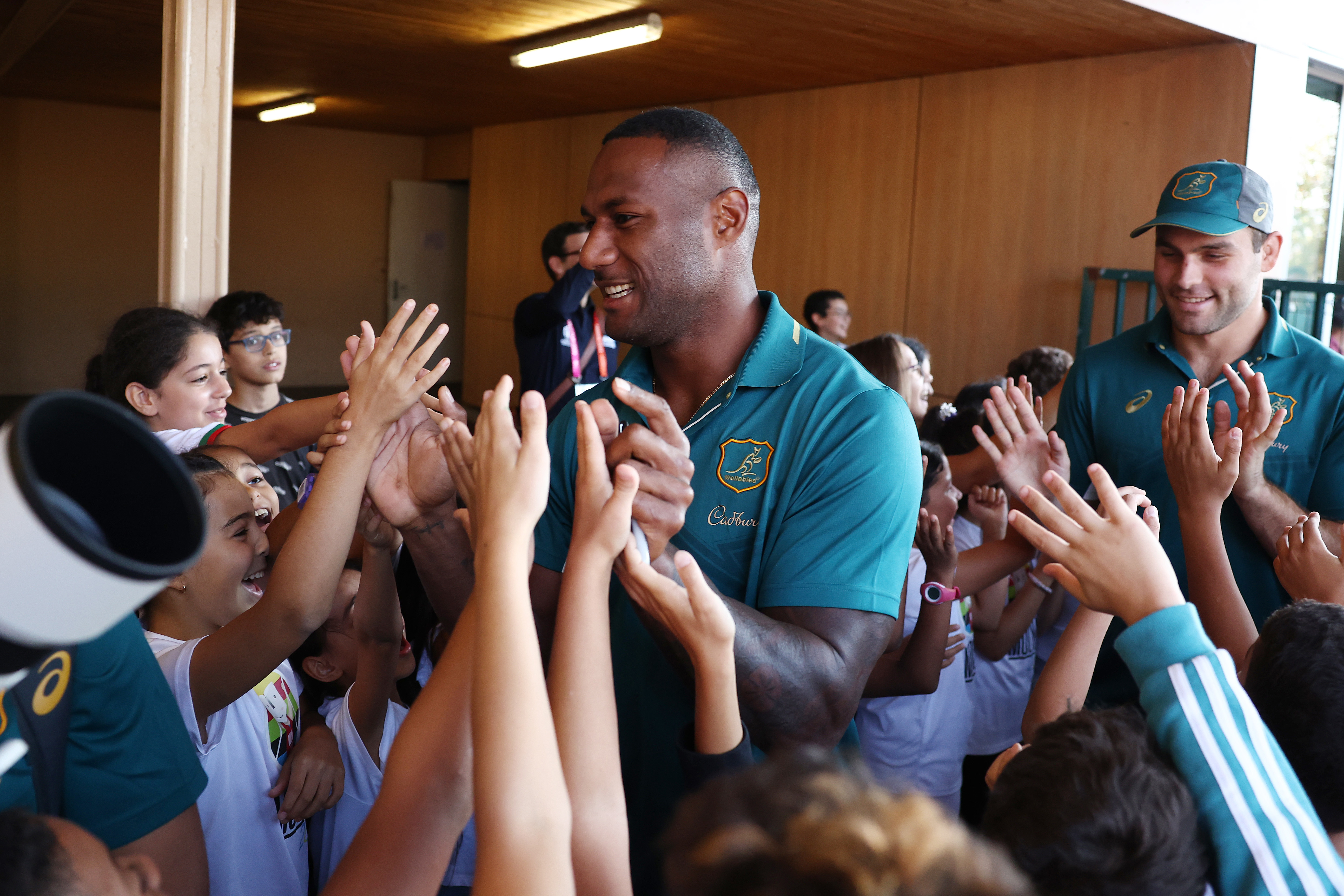 Suliasi Vunivalu of the Wallabies arrives at a school visit in Saint-Etienne.