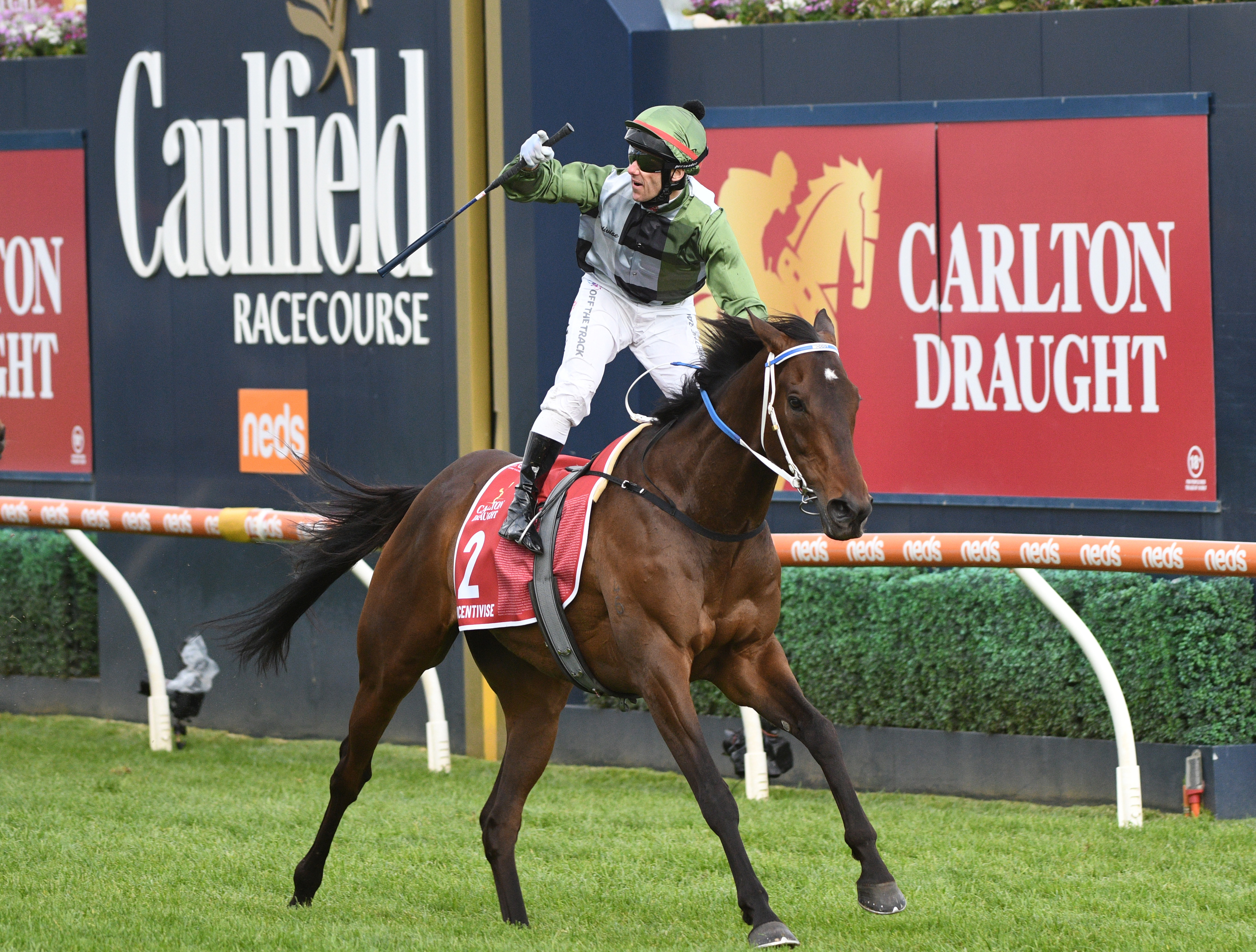 Brett Prebble riding Incentivise winning the Caulfield Cup.