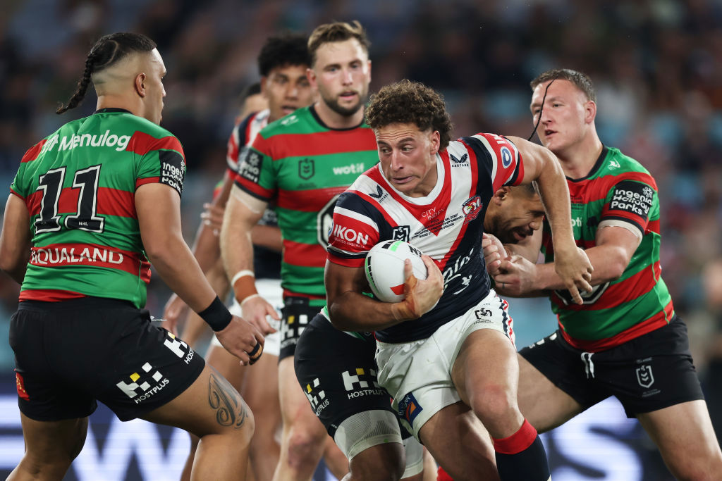 Mark Nawaqanitawase of the Roosters is tackled during the round 27 NRL match.