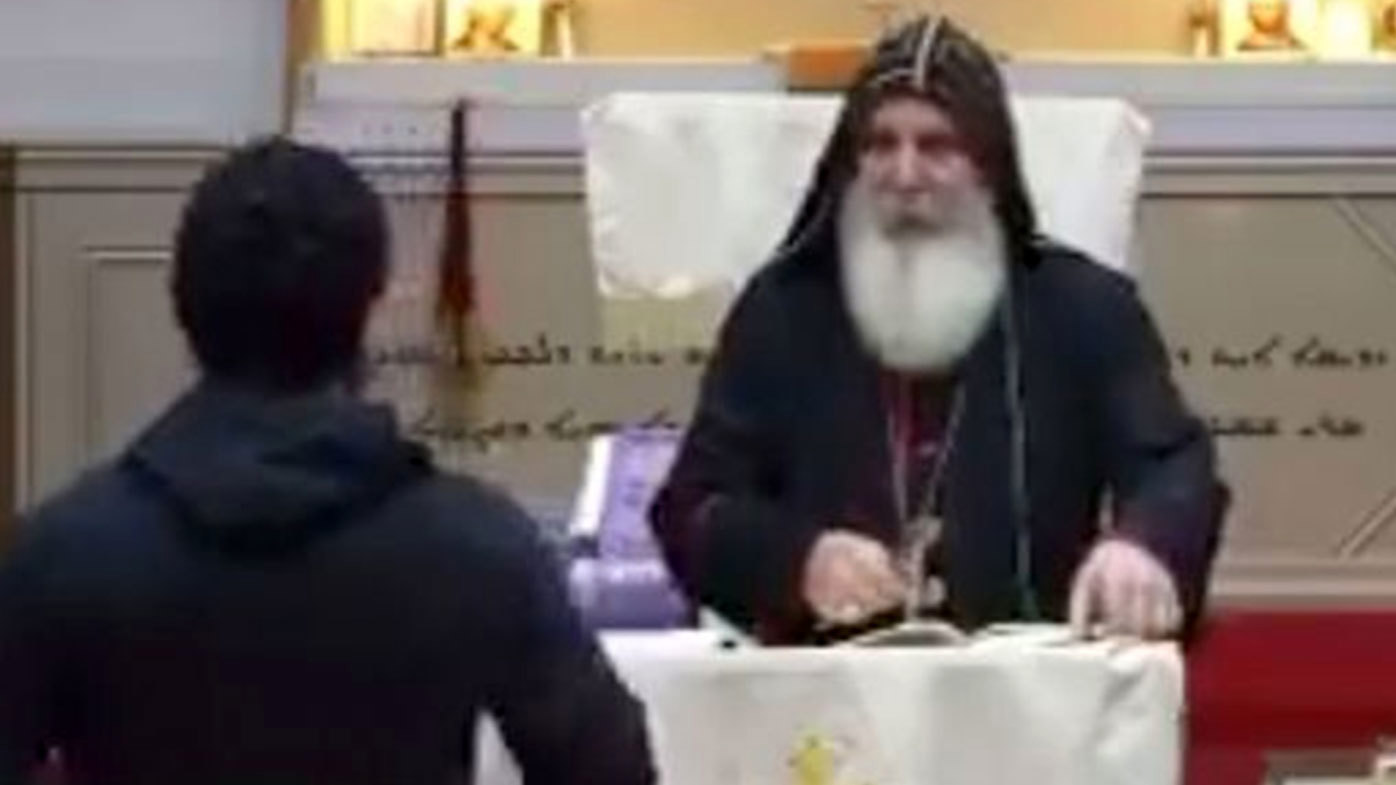 A livestream online shows Bishop Mar Mari Emmanuel giving a service when he is approached by an attacker at Christ The Good Shepherd Church in Wakeley, Sydney.