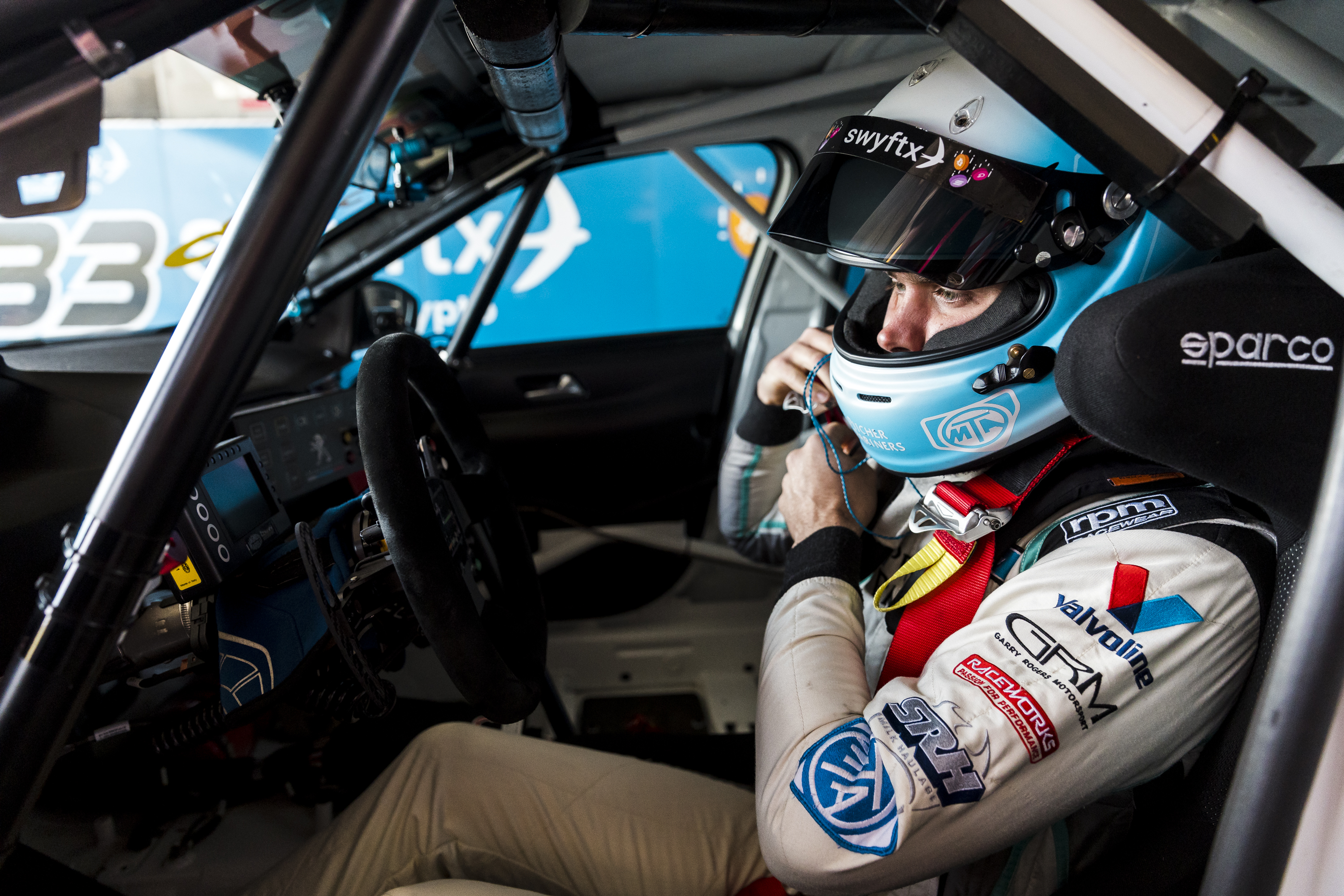 Jordan Cox onboard his Peugeot 308.