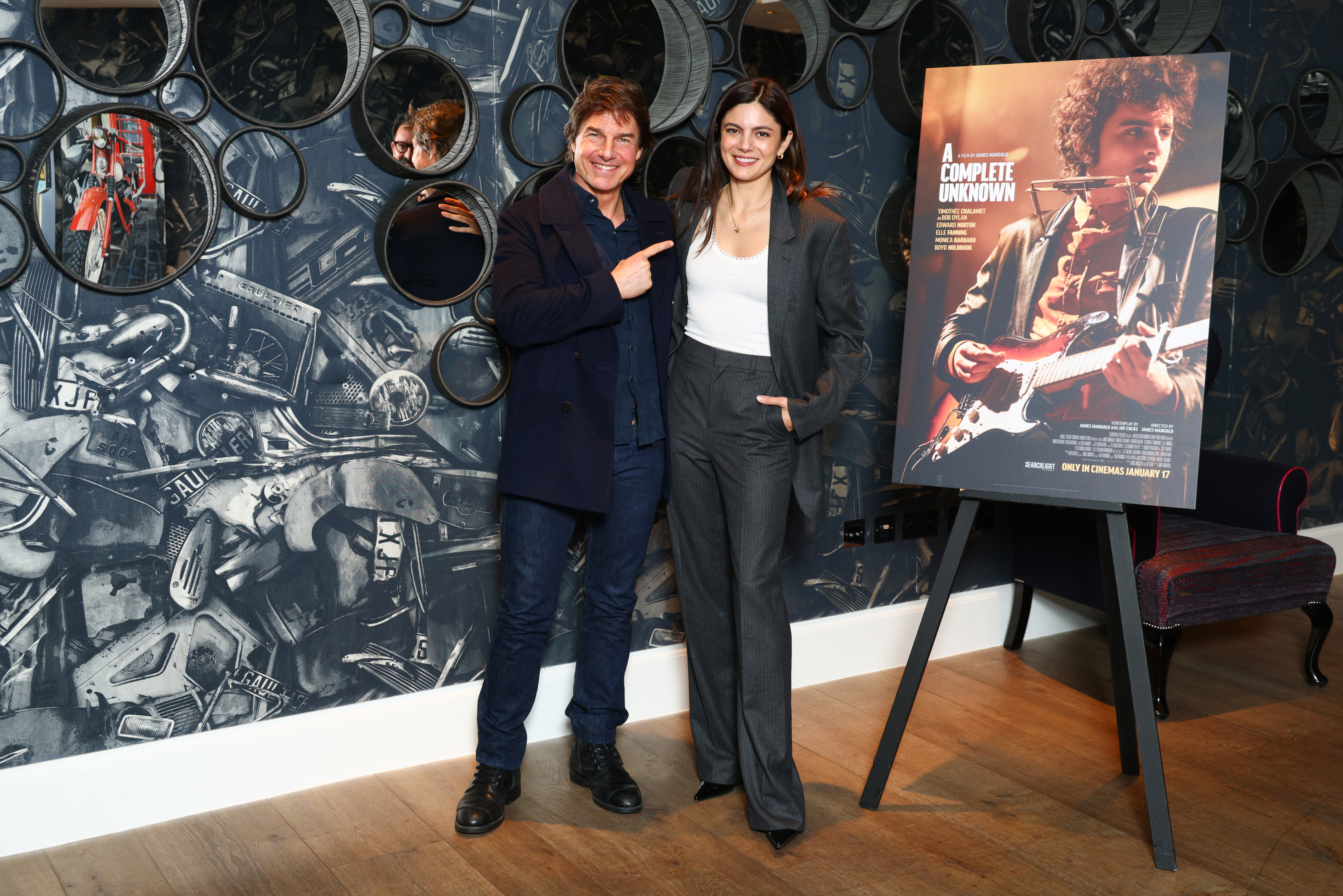 Tom Cruise and Monica Barbaro at the UK Awards Screening of A Complete Unknown at Ham Yard Hotel on December 17, 2024 in London, England. 