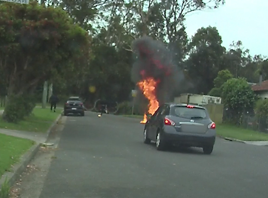 P﻿olice have released dashcam footage of two men allegedly starting a car fire and running away, following a suspected failed gang hit in Auburn yesterday. 