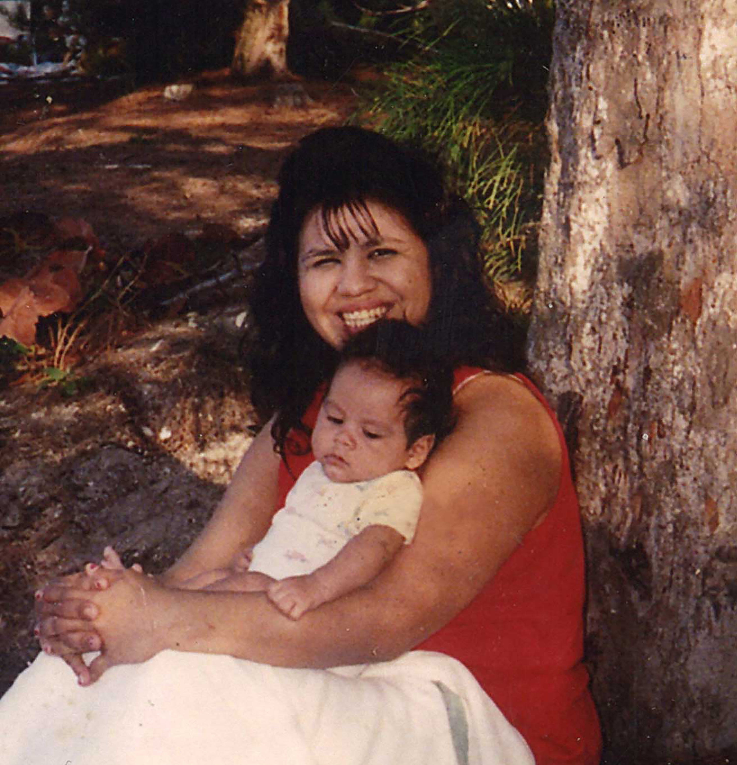 Texas death row inmate Melissa Lucio is holding one of her sons, John. 