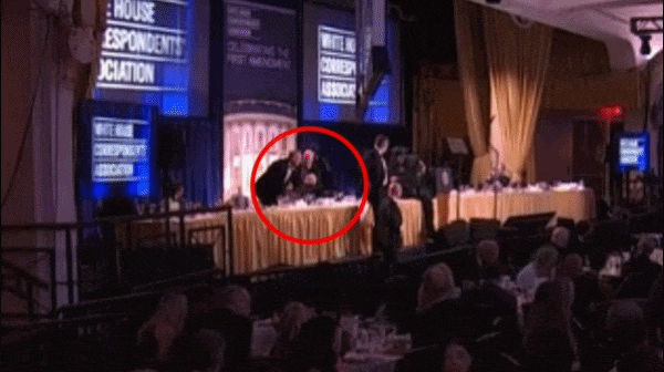 Moment alleged shooter runs past security