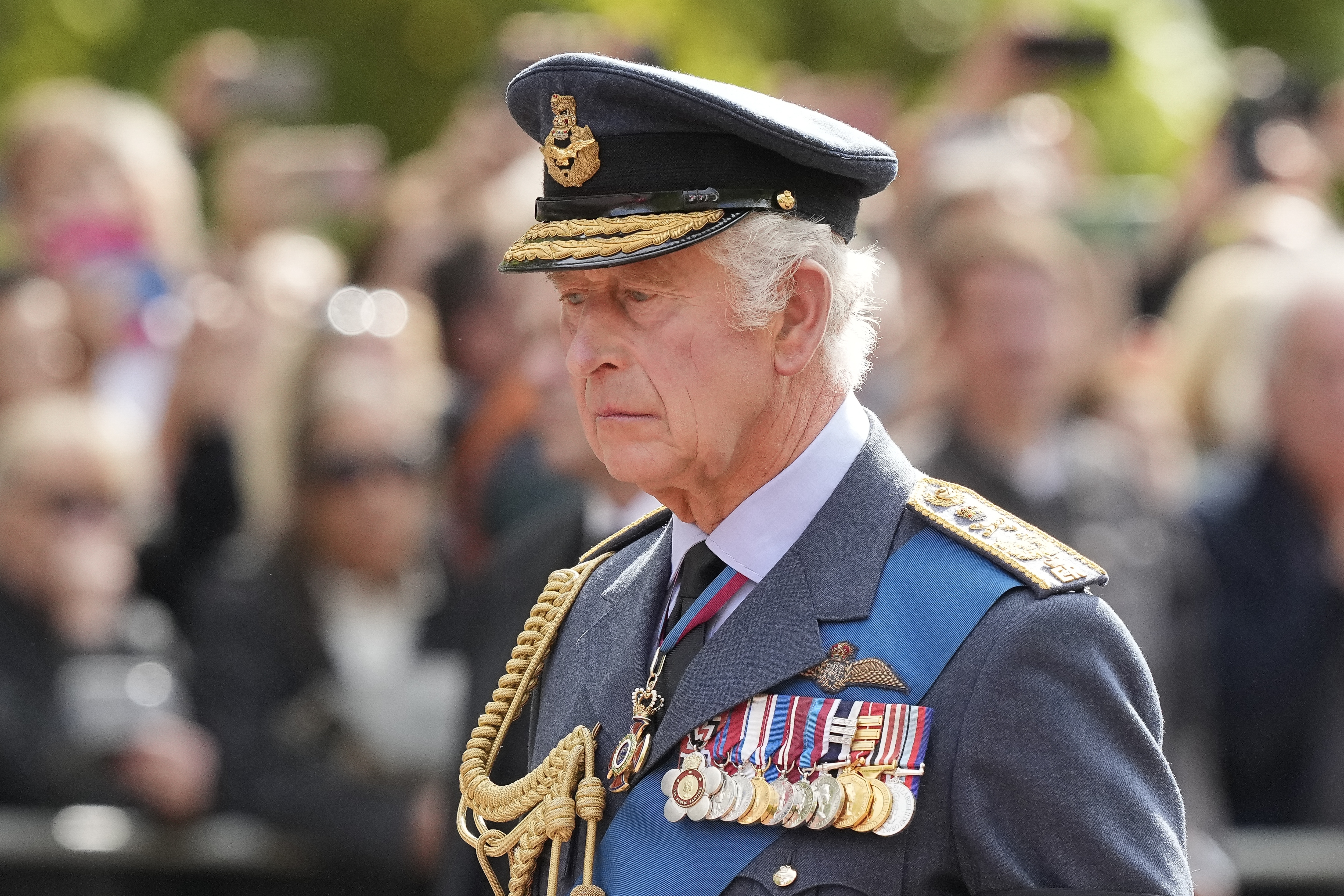 Britain's King Charles III follows the coffin of Queen Elizabeth II during a procession from Buckingham Palace to Westminster Hall in London, Wednesday, Sept. 14, 2022. The Queen will lie in state in Westminster Hall for four full days before her funeral on Monday Sept. 19. (AP Photo/Martin Meissner, Pool)