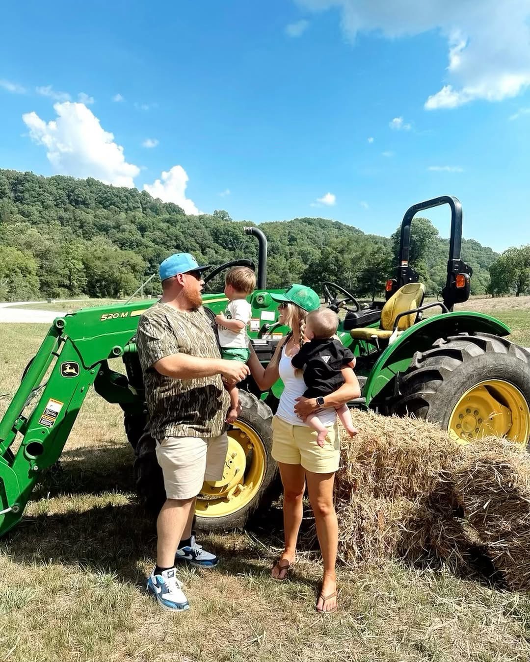 Luke Combs with his wife Nicole and their two kids