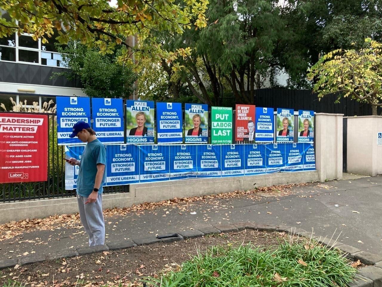 Labor is seeking an injunction over "Put Labor Last" signs appearing in Higgins, designed to look like they were placed by the Greens but allegedly from the Liberal Party.