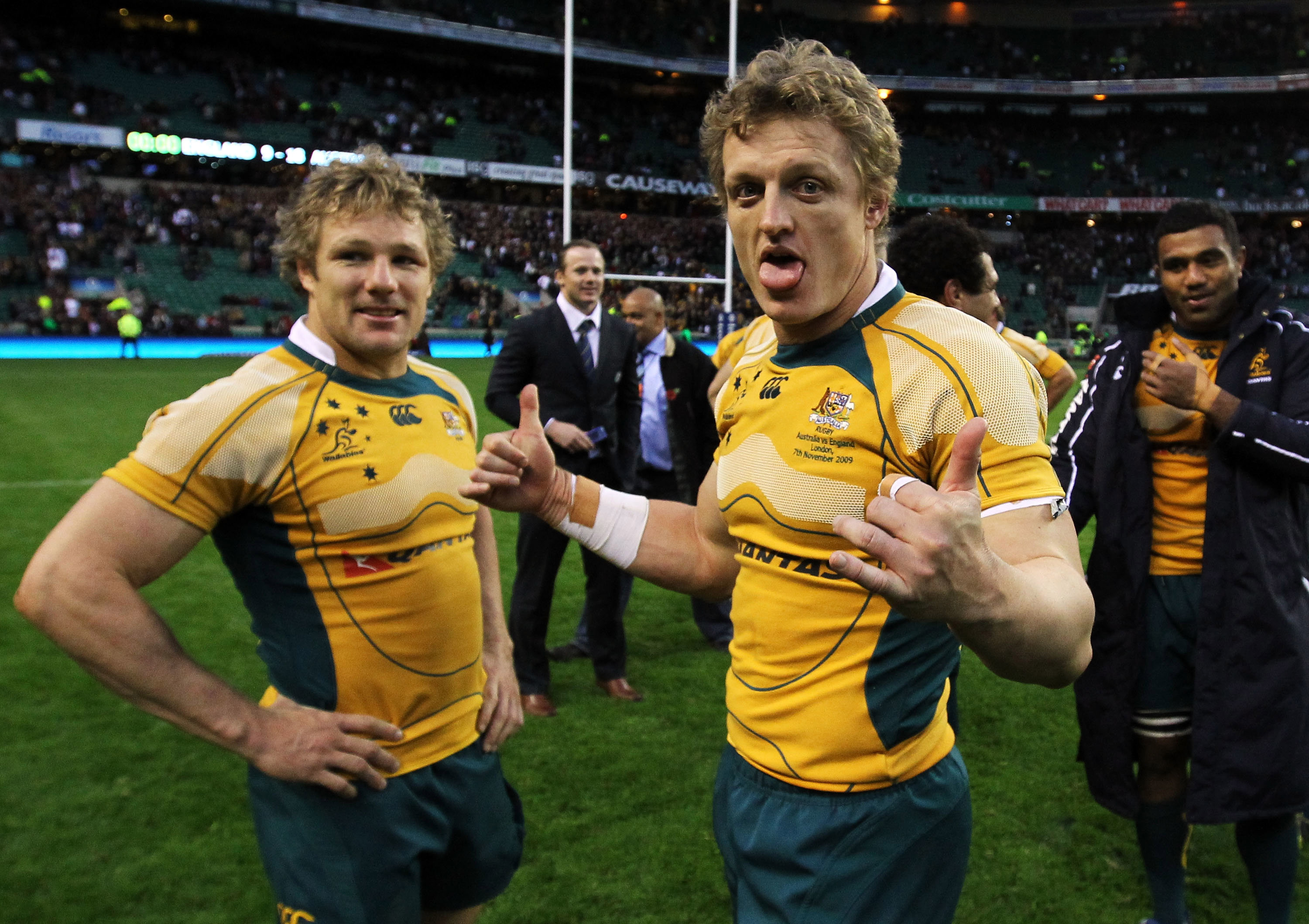 Peter Hynes and Ryan Cross of Australia celebrate victory over England at Twickenham in 2009.