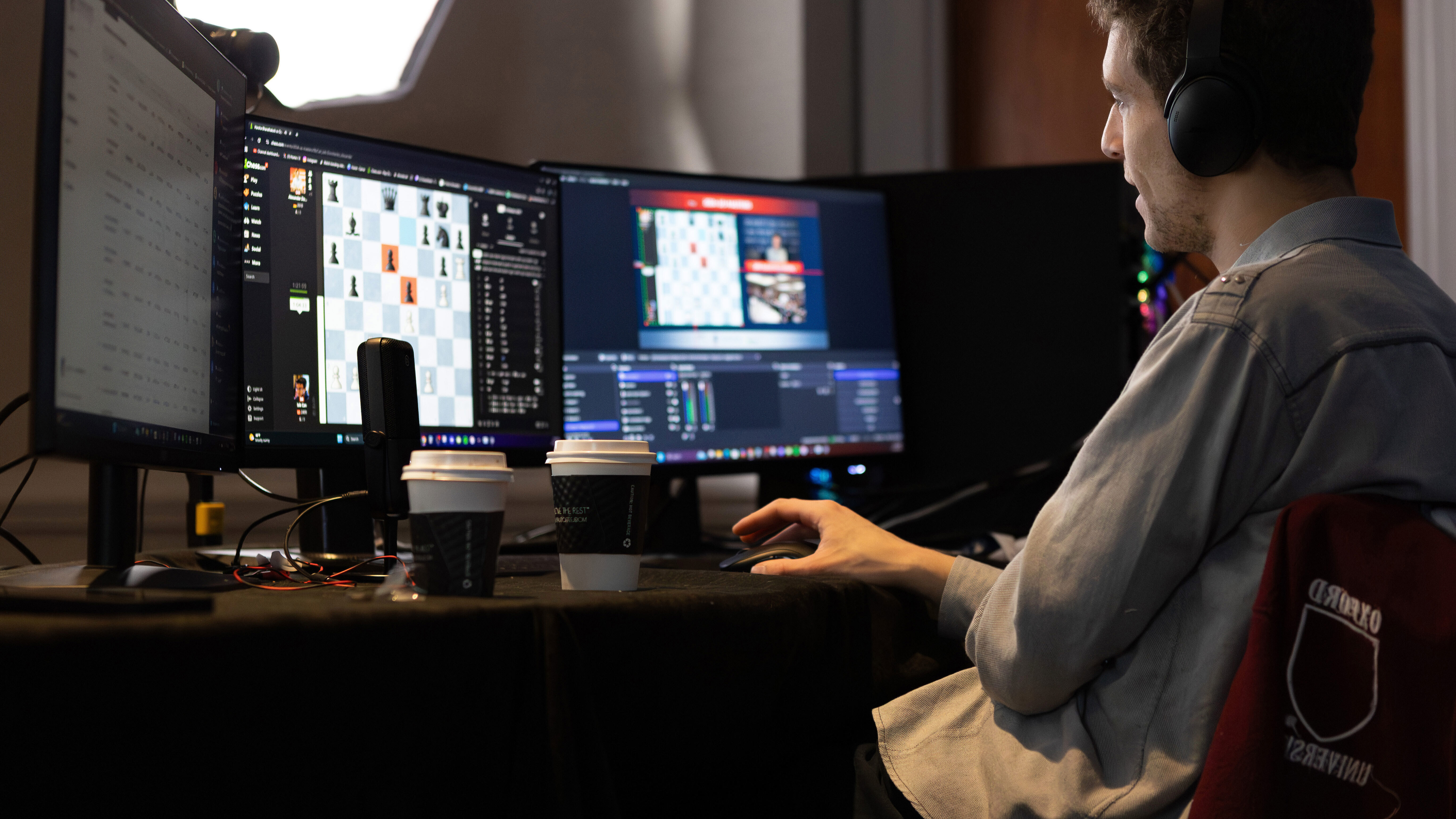 This undated photo released by Charlotte Chess Centre shows Daniel Naroditsky playing chess at the computer. 
