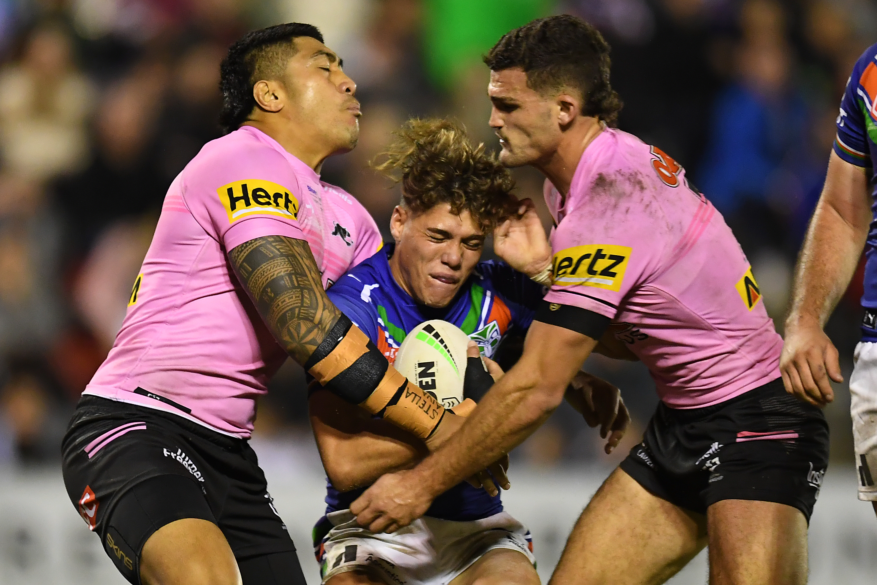 Reece Walsh of the Warriors is tackled during the round 15 NRL match between the New Zealand Warriors and the Penrith Panthers at Moreton Daily Stadium, on June 18, 2022, in Brisbane, Australia. (Photo by Albert Perez/Getty Images)