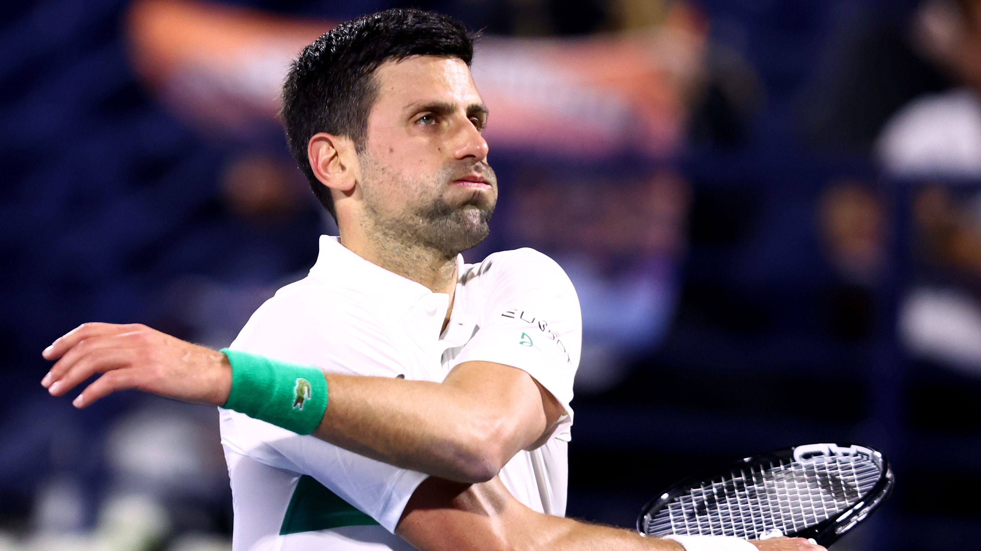 Novak Djokovic looks on against Lorenzo Musetti of Italy during day eight of the Dubai Duty Free tournament last month.