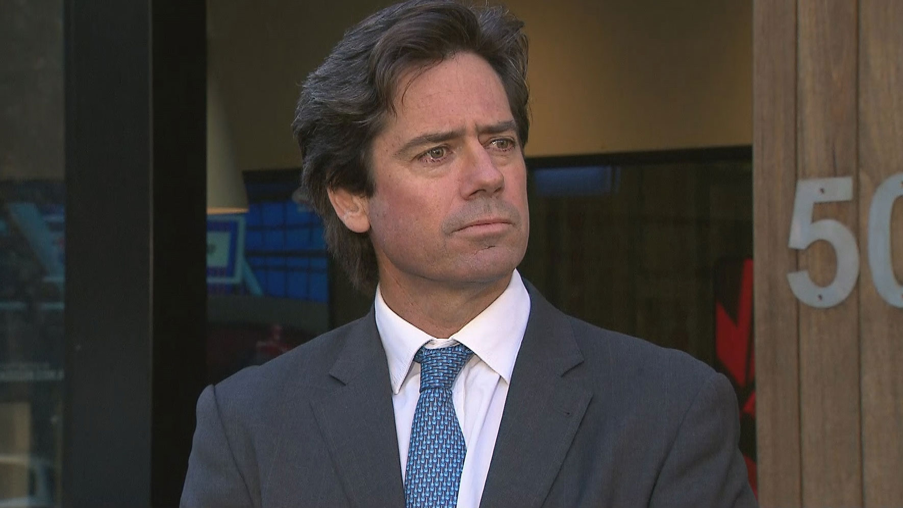 Gillon McLachlan addresses the media.