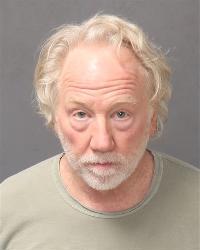Director and Emmy Award-winning actor Timothy Busfield surrendered to New Mexico authorities four days after a warrant was issued for his arrest over allegations he sexually abused a child actor on the set of his television show.