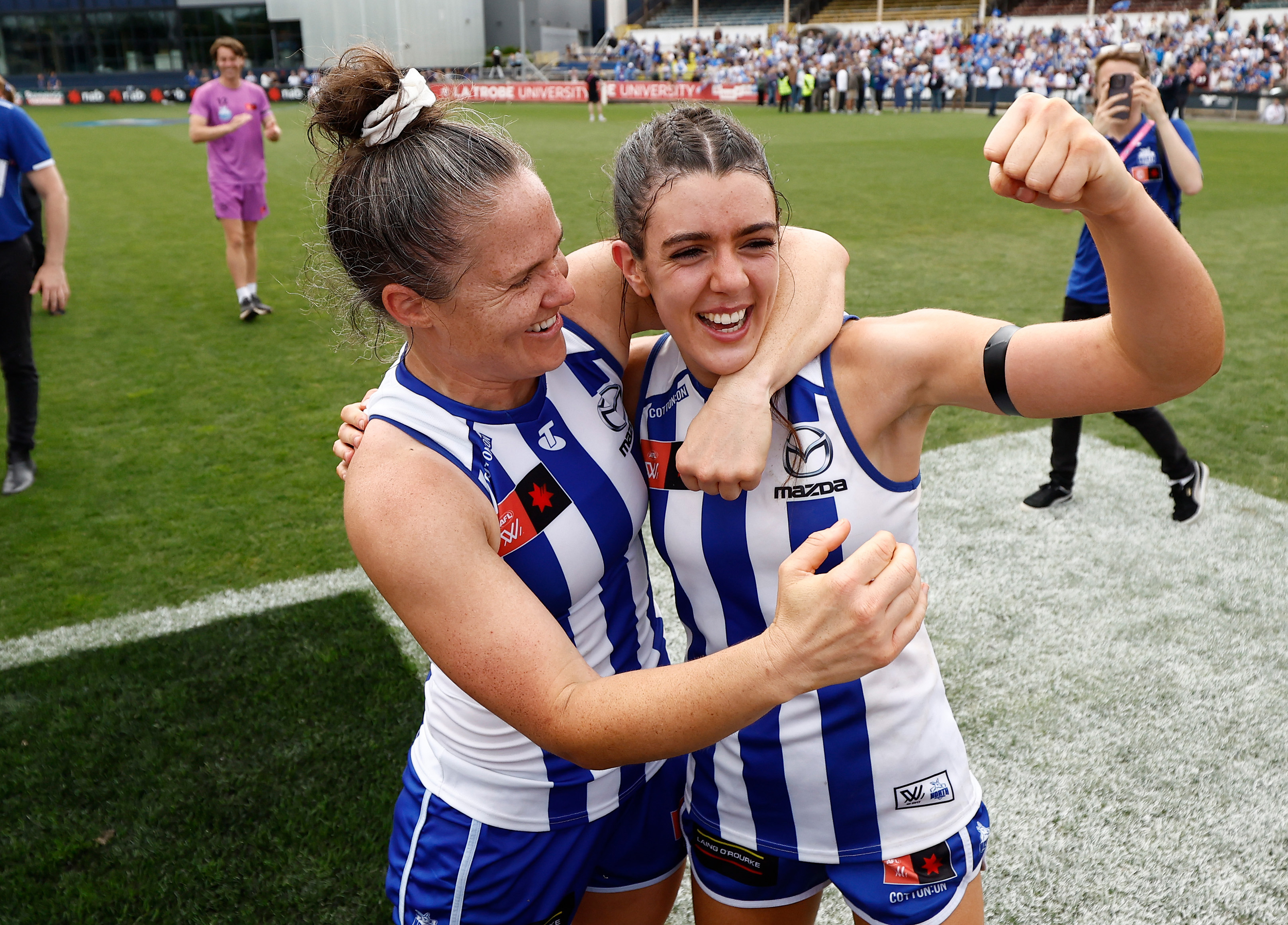 MELBOURNE, AUSTRALIA - NOVEMBER 26: Emma Kearney (left) and Erika OShea of the Kangaroos celebrate during the 2023 AFLW Second Preliminary Final match between The North Melbourne Tasmanian Kangaroos and The Adelaide Crows at IKON Park on November 26, 2023 in Melbourne, Australia. (Photo by Michael Willson/AFL Photos via Getty Images)
