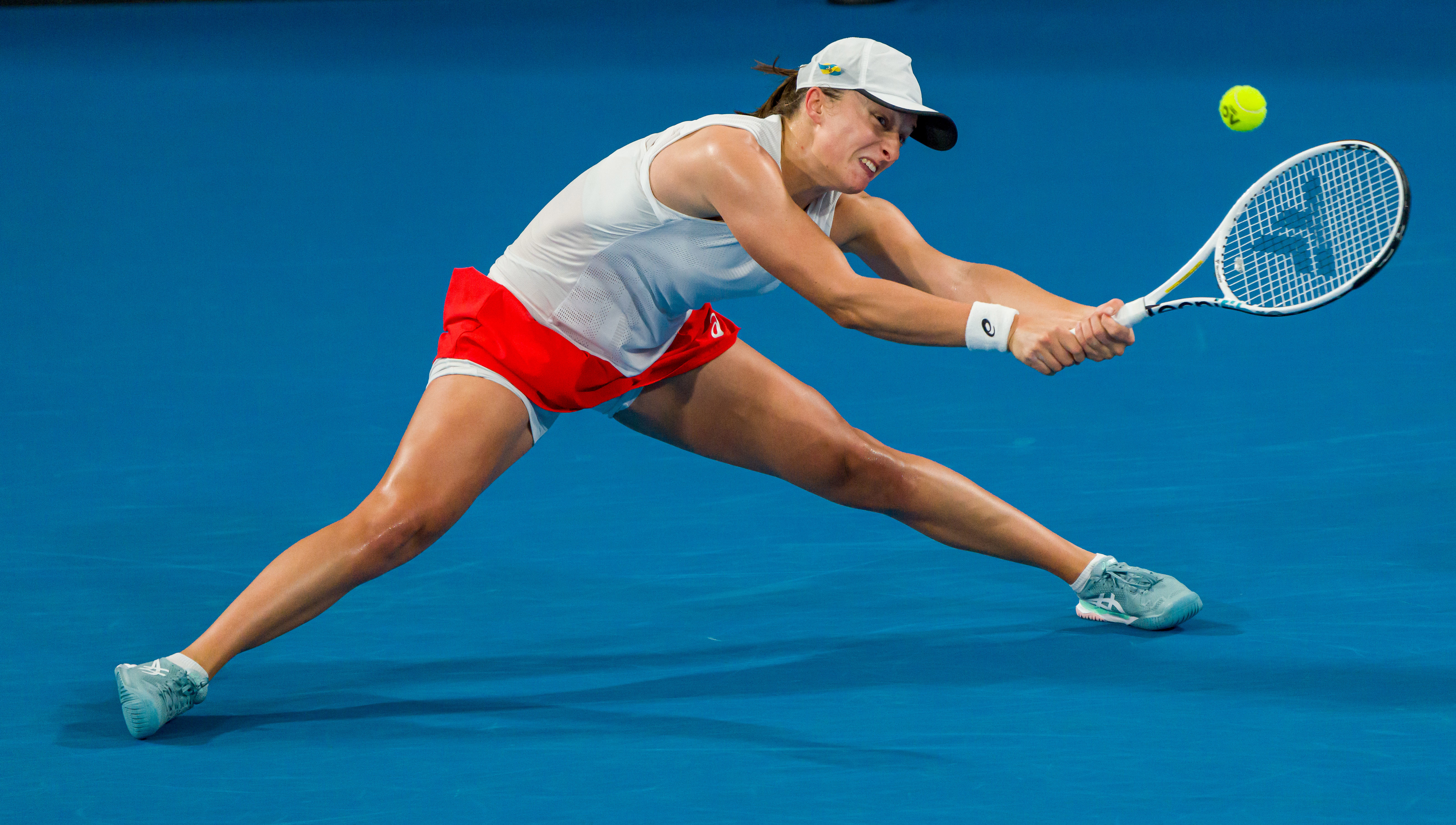 Iga Swiatek of Poland competes against Jessica Pegula of the USA  during day eight of the 2023 United Cup at Ken Rosewall Arena on January 6, 2023 in Sydney, Australia.