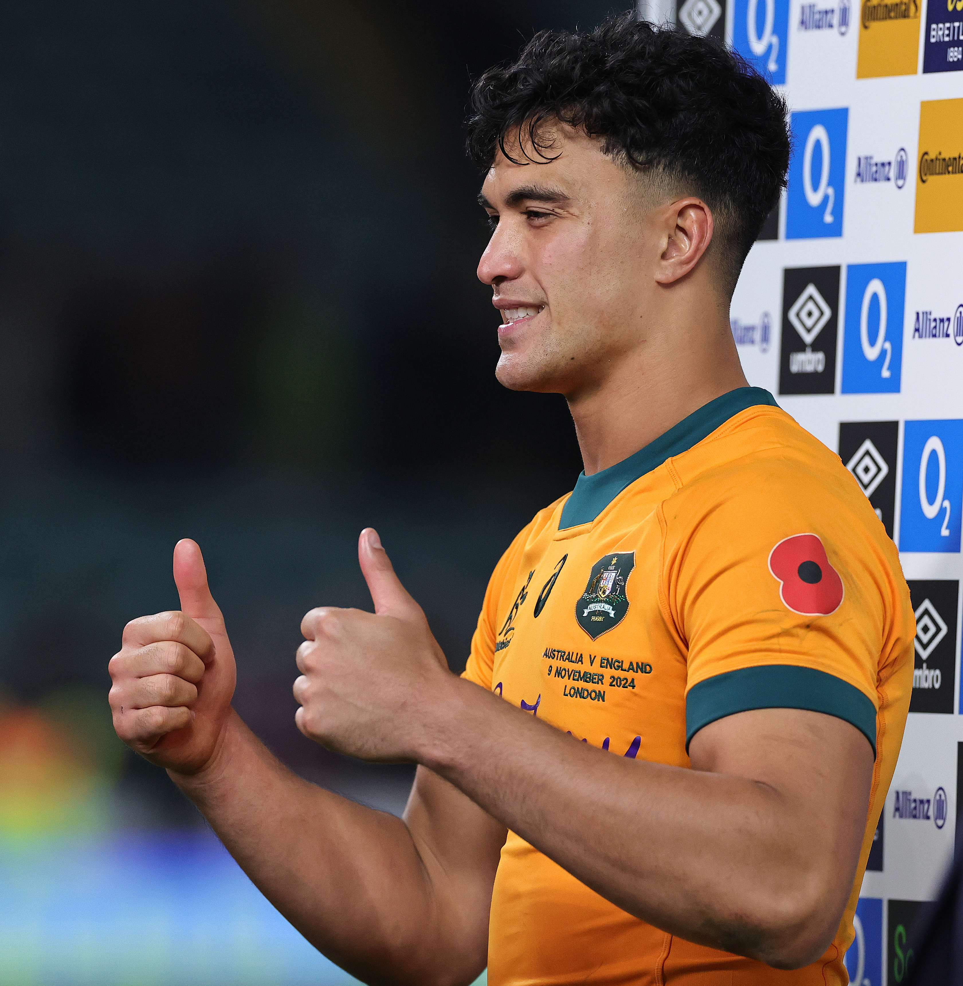 Joseph-Aukuso Suaalii of Australia celebrates after their victory.