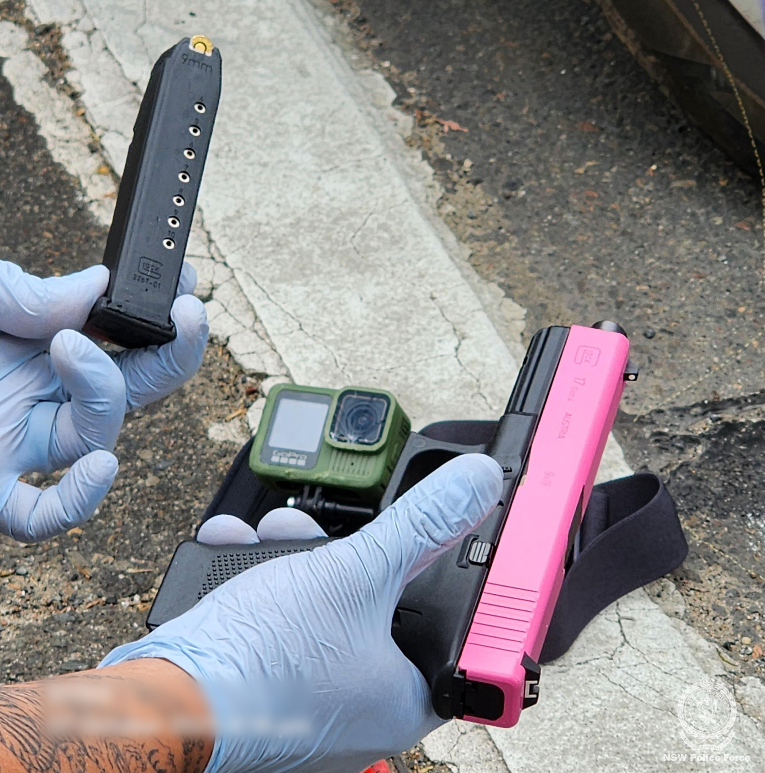 A pink gun, green GoPro and ammunition seized by police in an attempted hitjob.