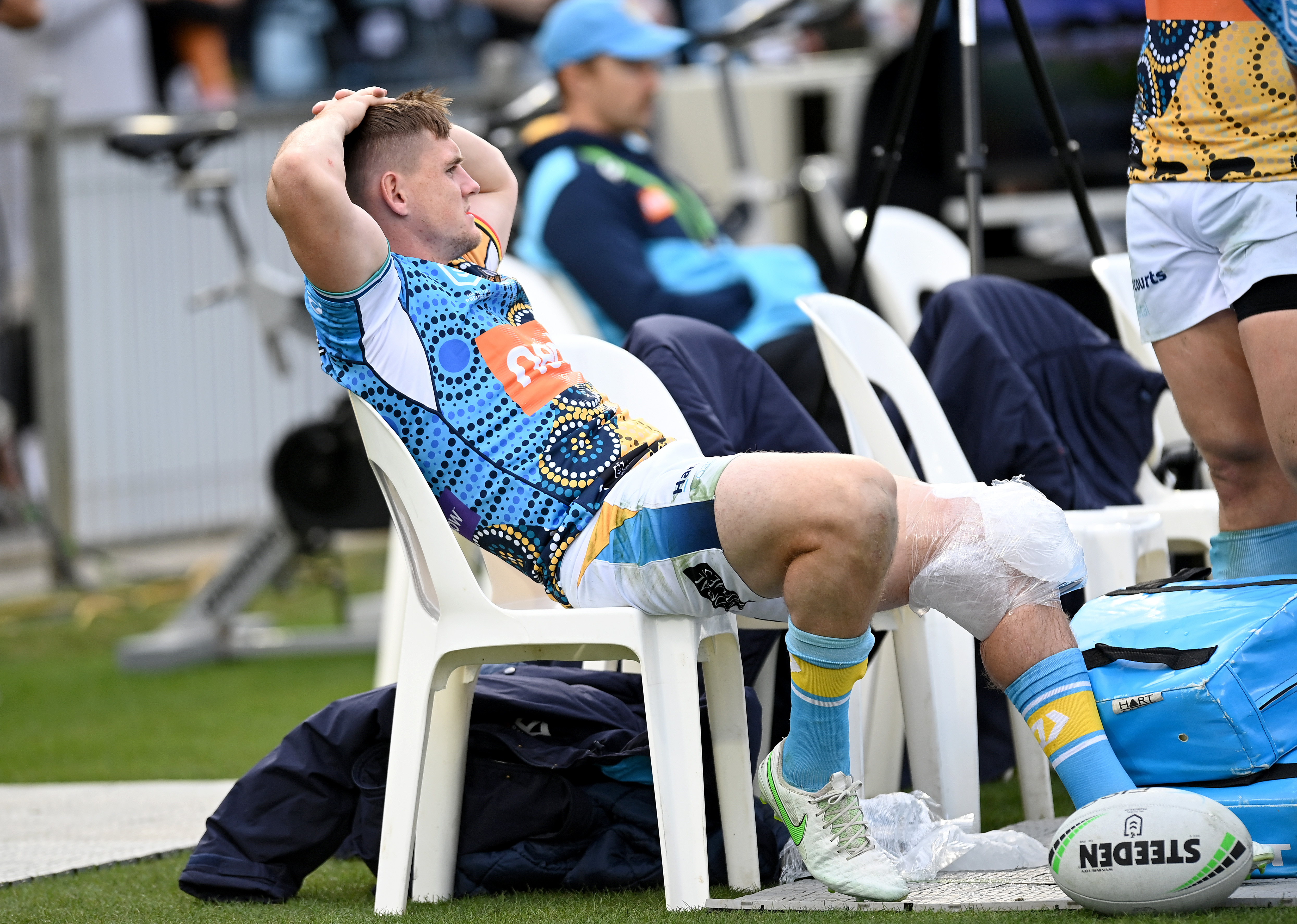  AJ Brimson on the sidelines after being injured during the round 12 NRL match between the Cronulla Sharks and the Gold Coast Titans.