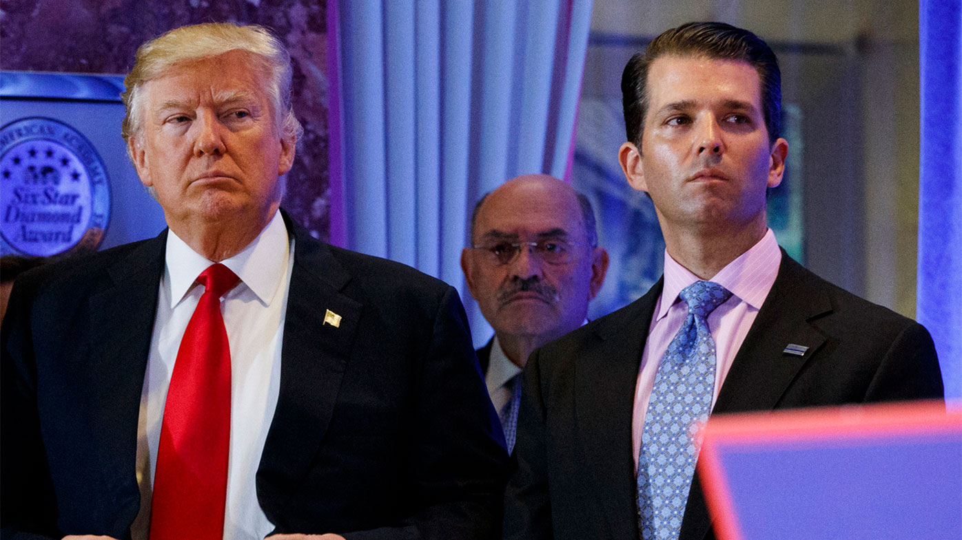 Donald Trump, left, his chief financial officer Allen Weisselberg, centre, and his son Donald Trump Jr.