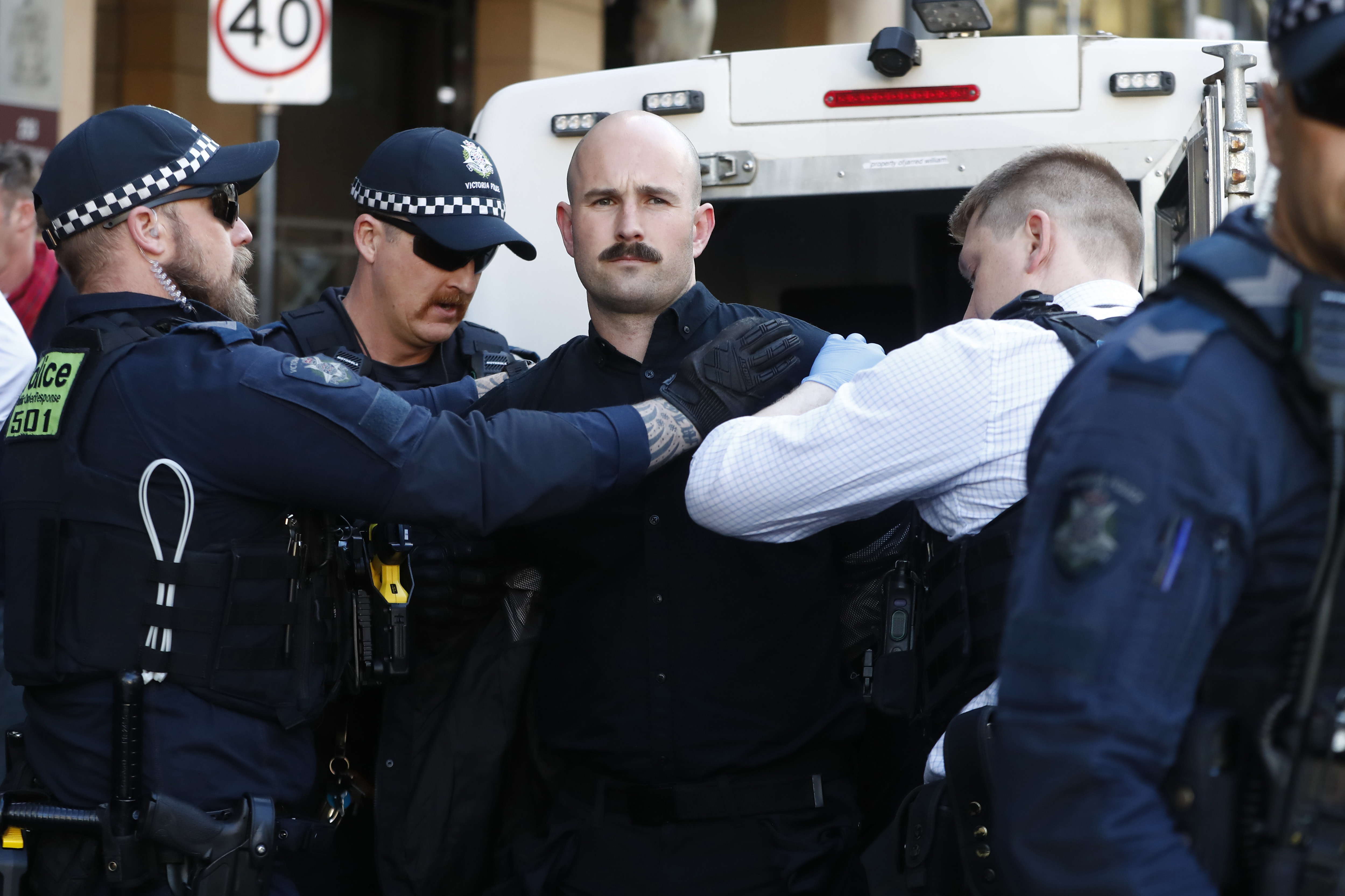 Thomas Sewell, the leader of the neo-Nazi group National Socialist Network, was arrested by Victoria Police outside the Melbourne Magistrates' Court.