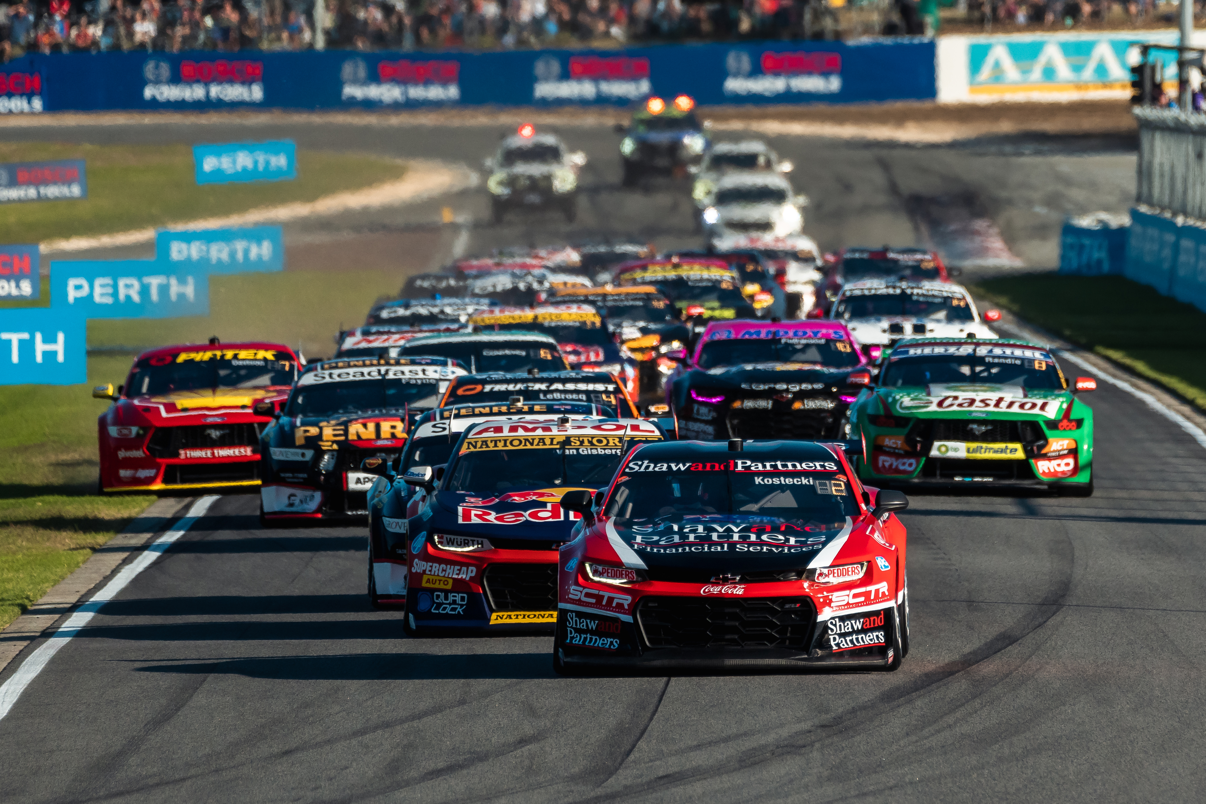 Brodie Kostecki leads the Supercars field into turn one at Wanneroo Raceway.