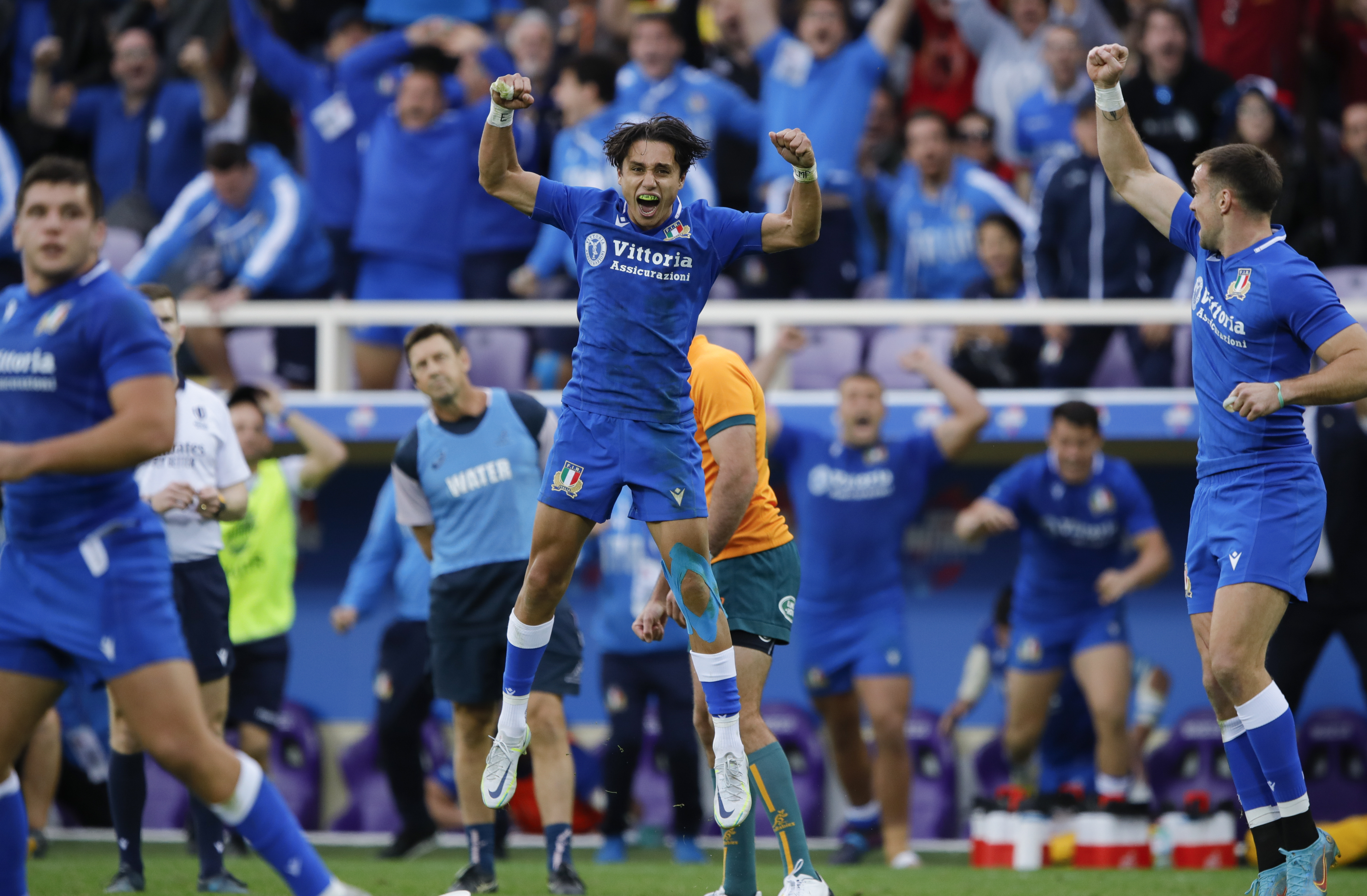 Ange Capuozzo of Italy celebrates at the final whistle.