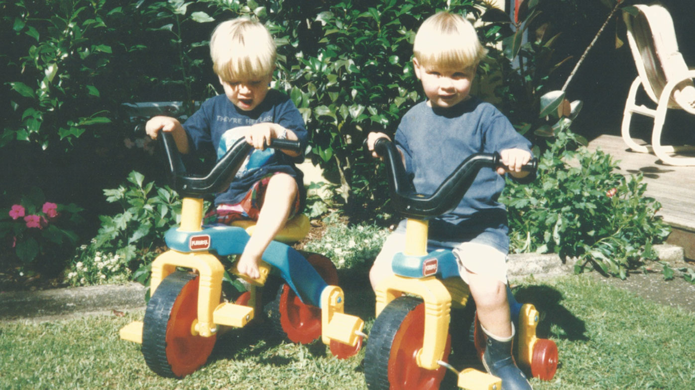 Alex (right) with his younger brother Andrei (left).