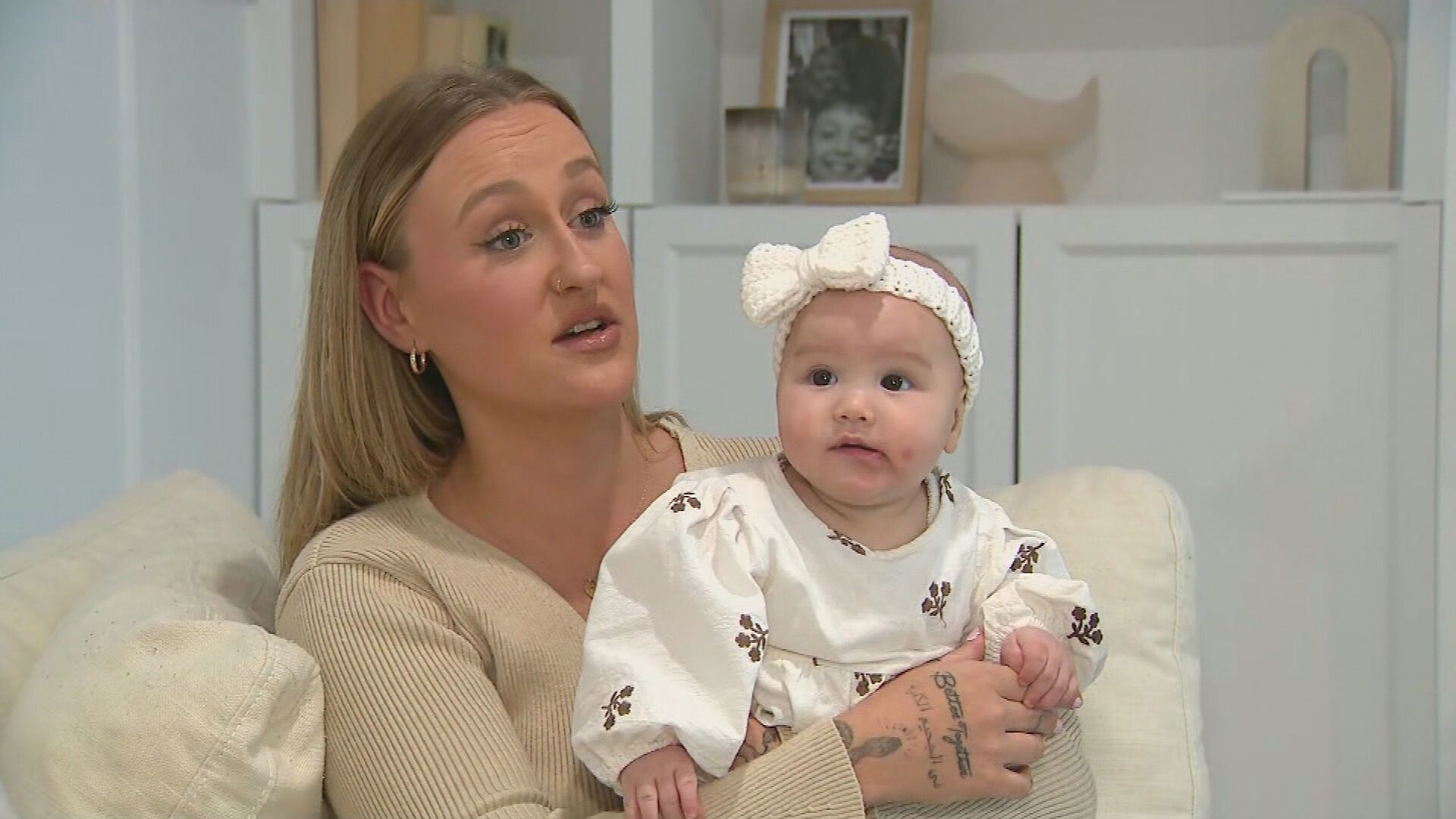 Tiffani Teasdale's partner Leon and her five-month-old daughter Pixie were travelling along High Street at Sippy Downs when two people approached their silver Suzuki Vitara on an e-bike.