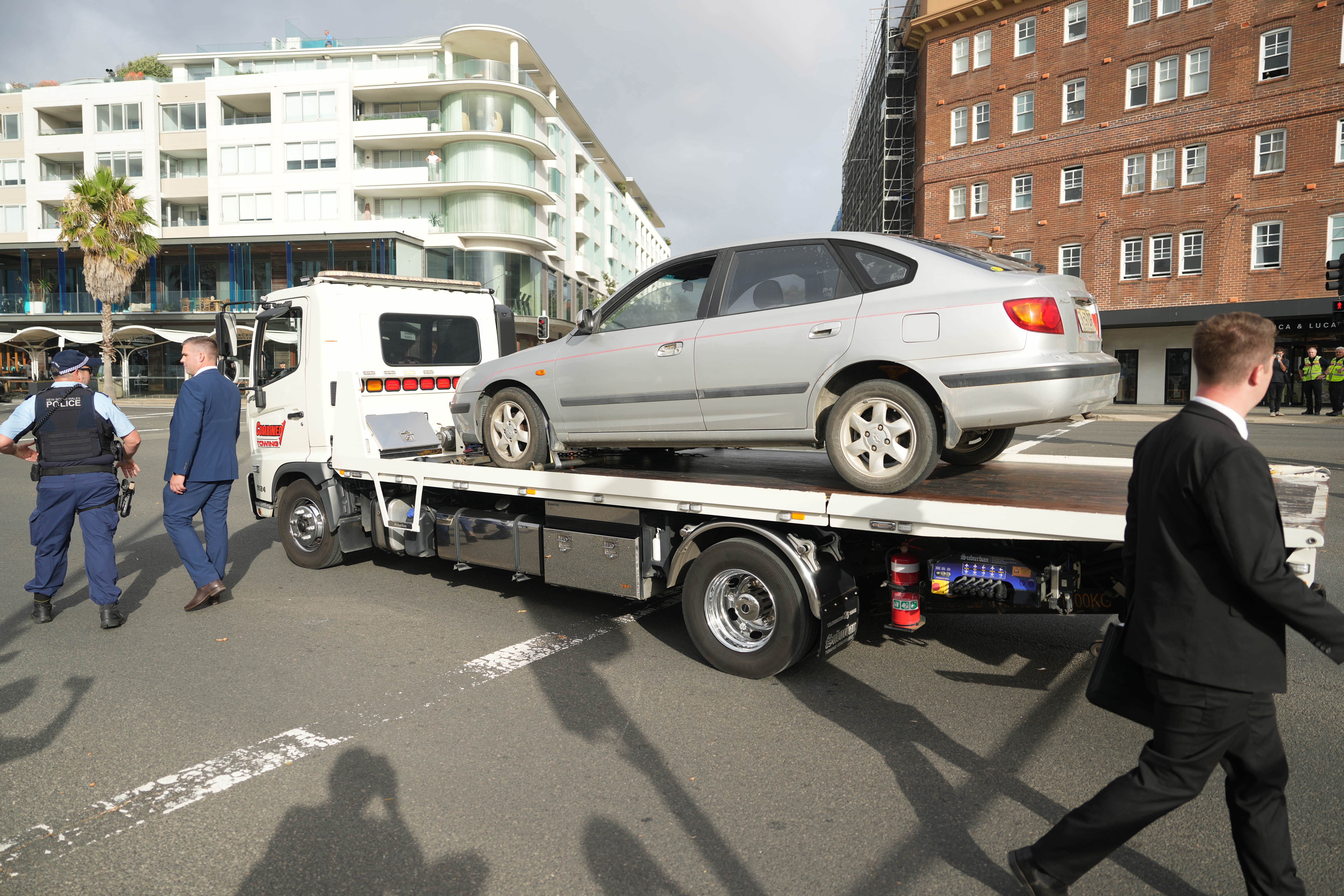 The gunmen's car is taken away after the Bondi Beach shooting.