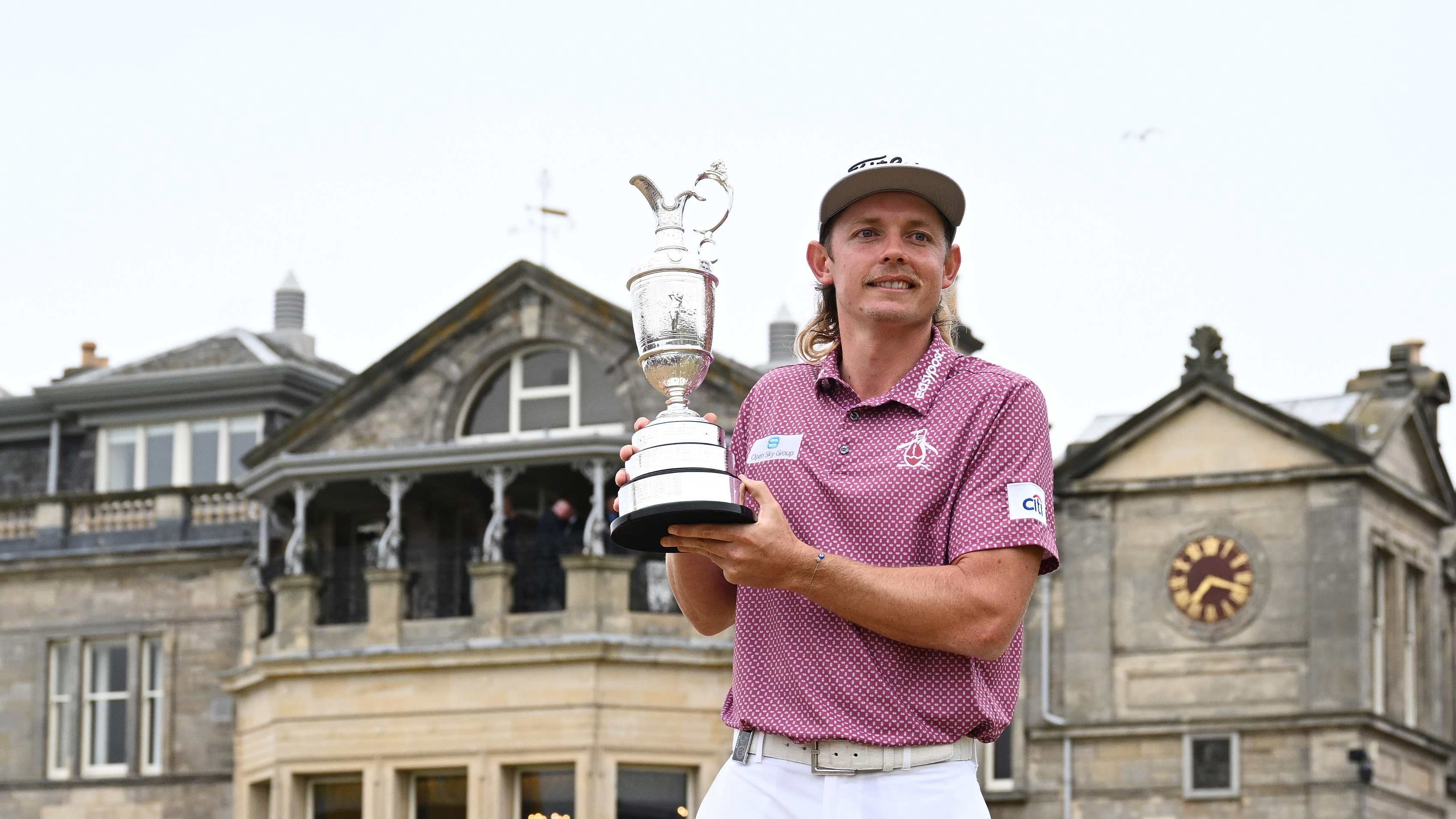 Cameron Smith with the Claret Jug in front of the Royal & Ancient Clubhouse at St Andrews.